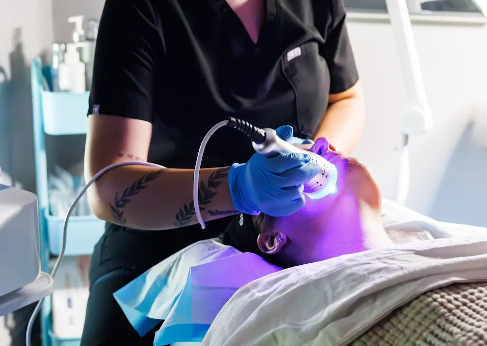 Diamond Hydrofacial treatment being performed on a client