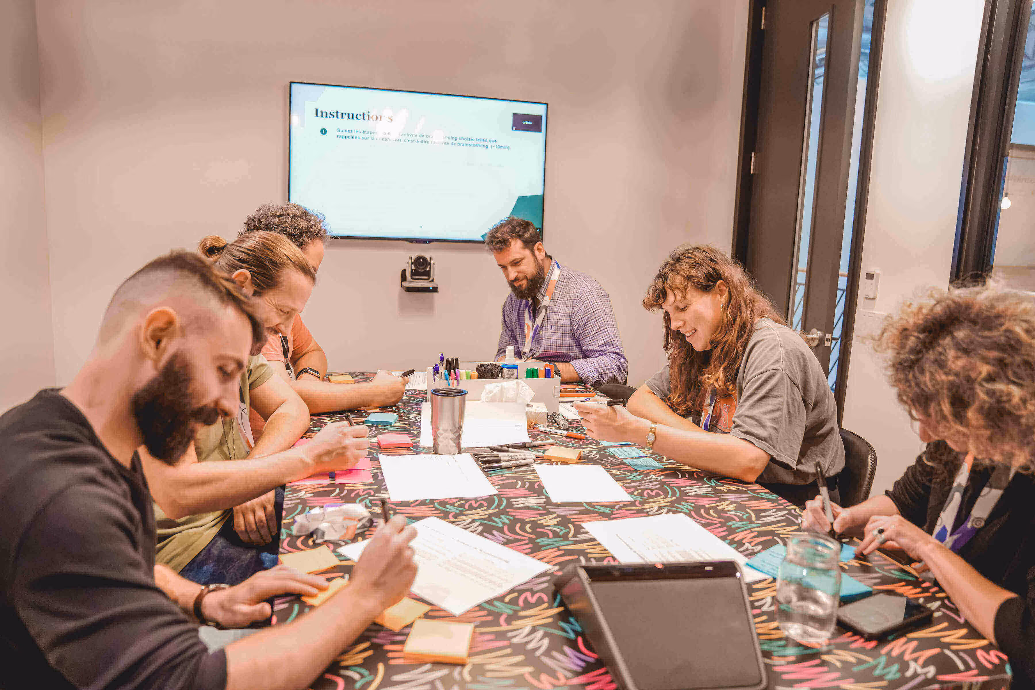 Workleap employees collaborating on a design thinking workshop for the innovate challenge.