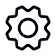 Dark circular gear icon with a few teeth visible against a black background.