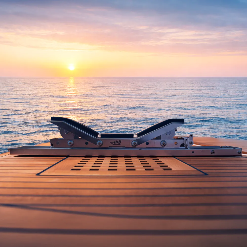 Close-up of adjustable stainless steel tender cradle with side support arms by H+B technics