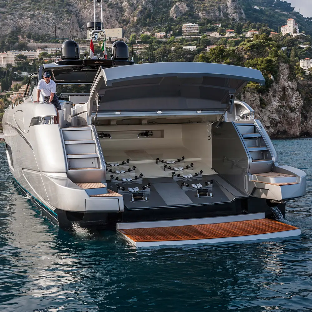 Yacht tender garage interior with roller track system and stainless steel fittings