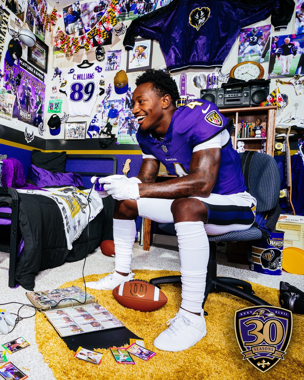 Zay on the Baltimore Ravens plays Nintendo on set