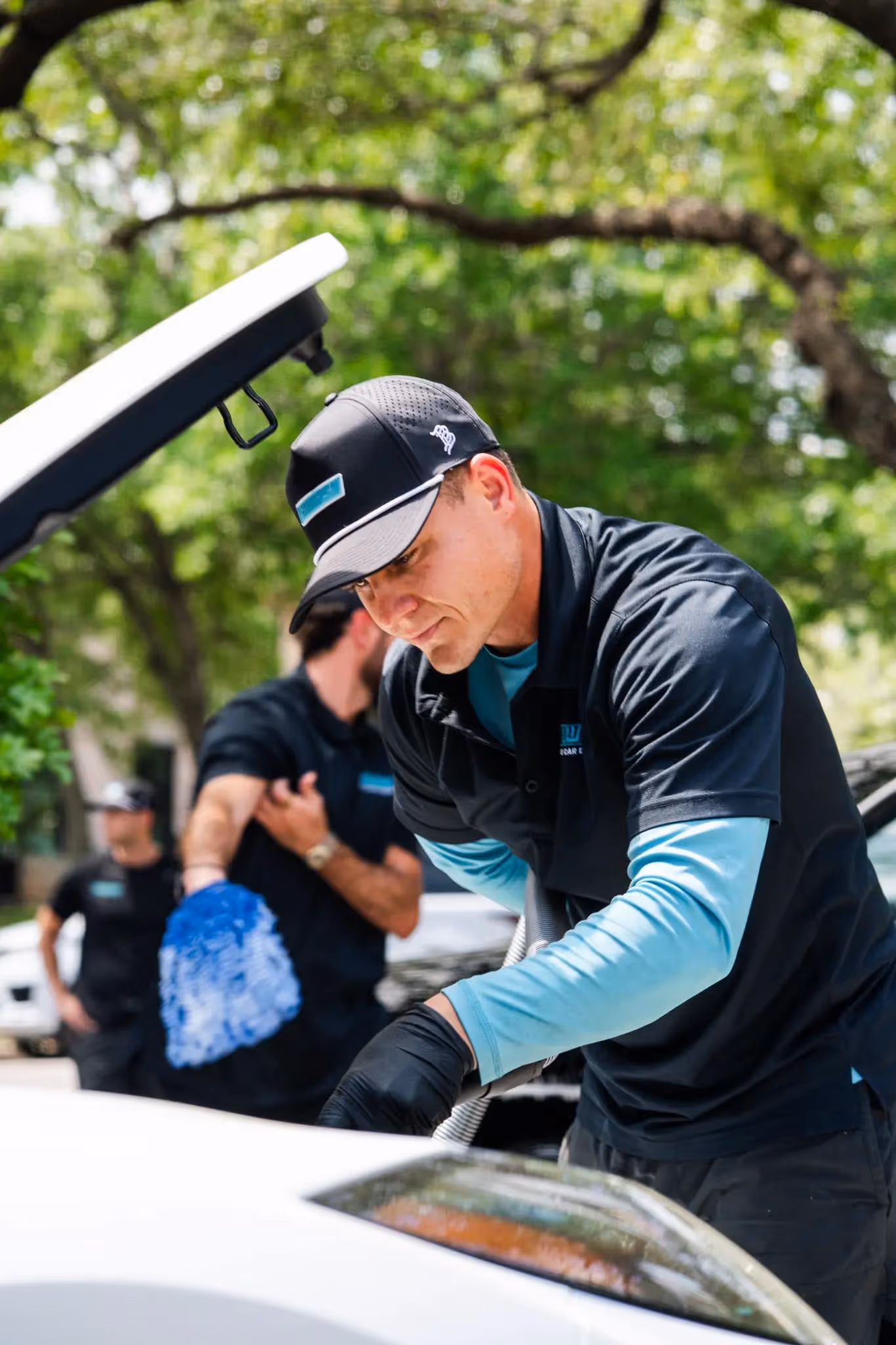 SHWASH mobile car detailing servicing a vehicle in Austin TX