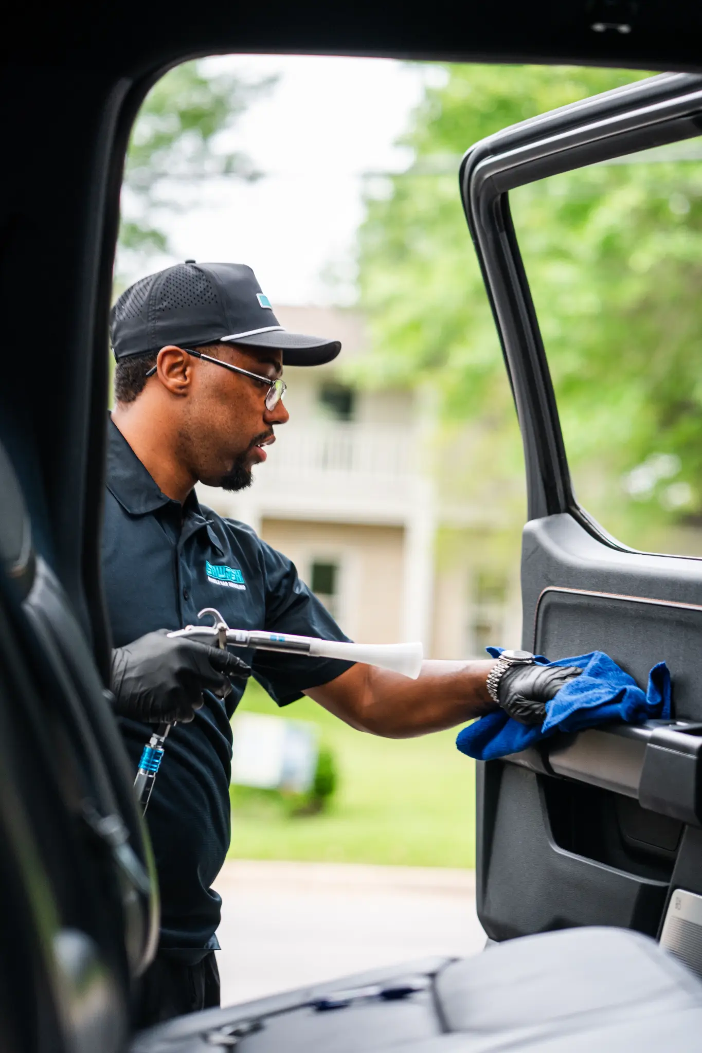SHWASH mobile car detailing servicing a vehicle in Austin TX