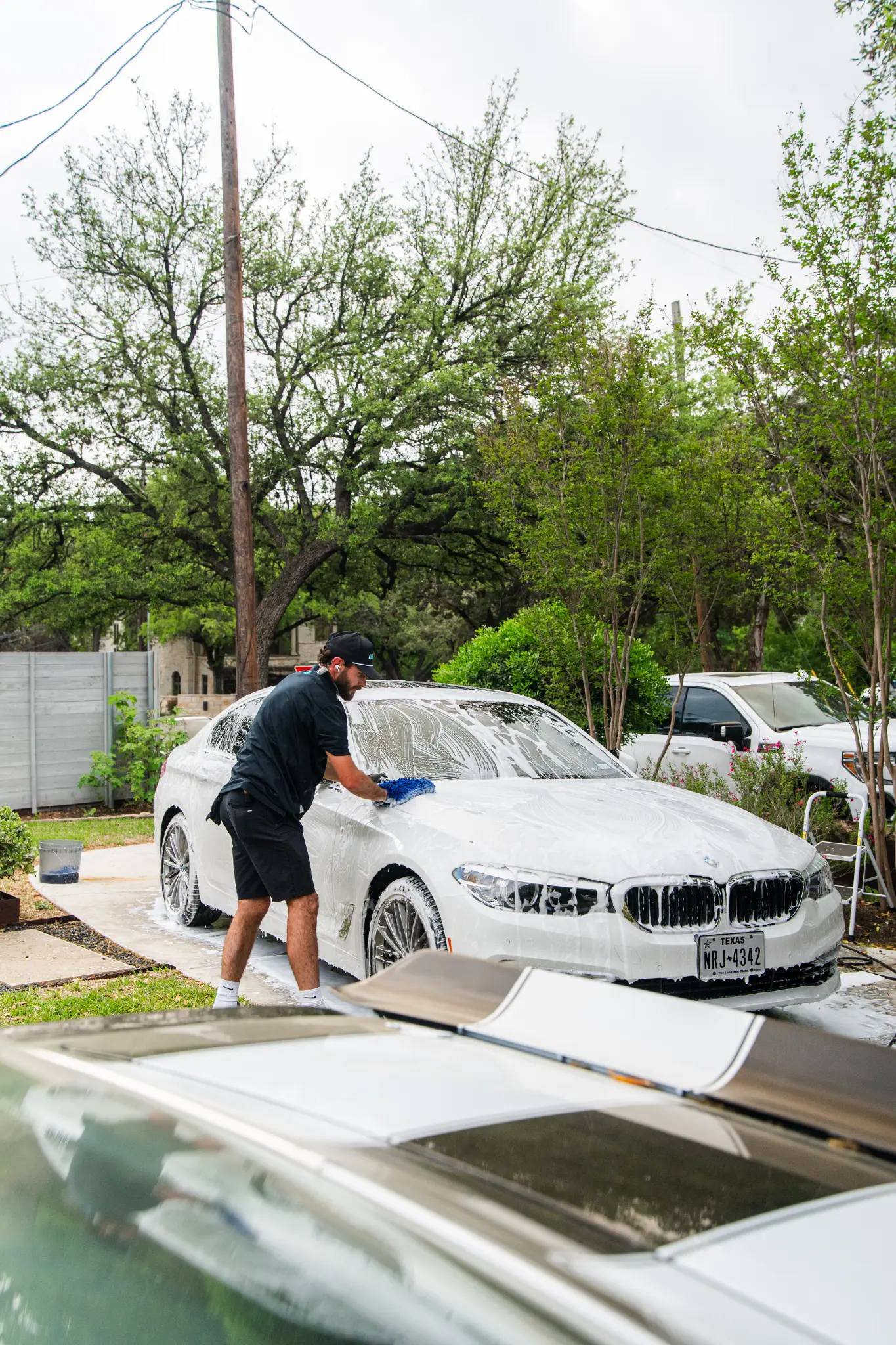 SHWASH mobile car detailing servicing a vehicle in Austin TX