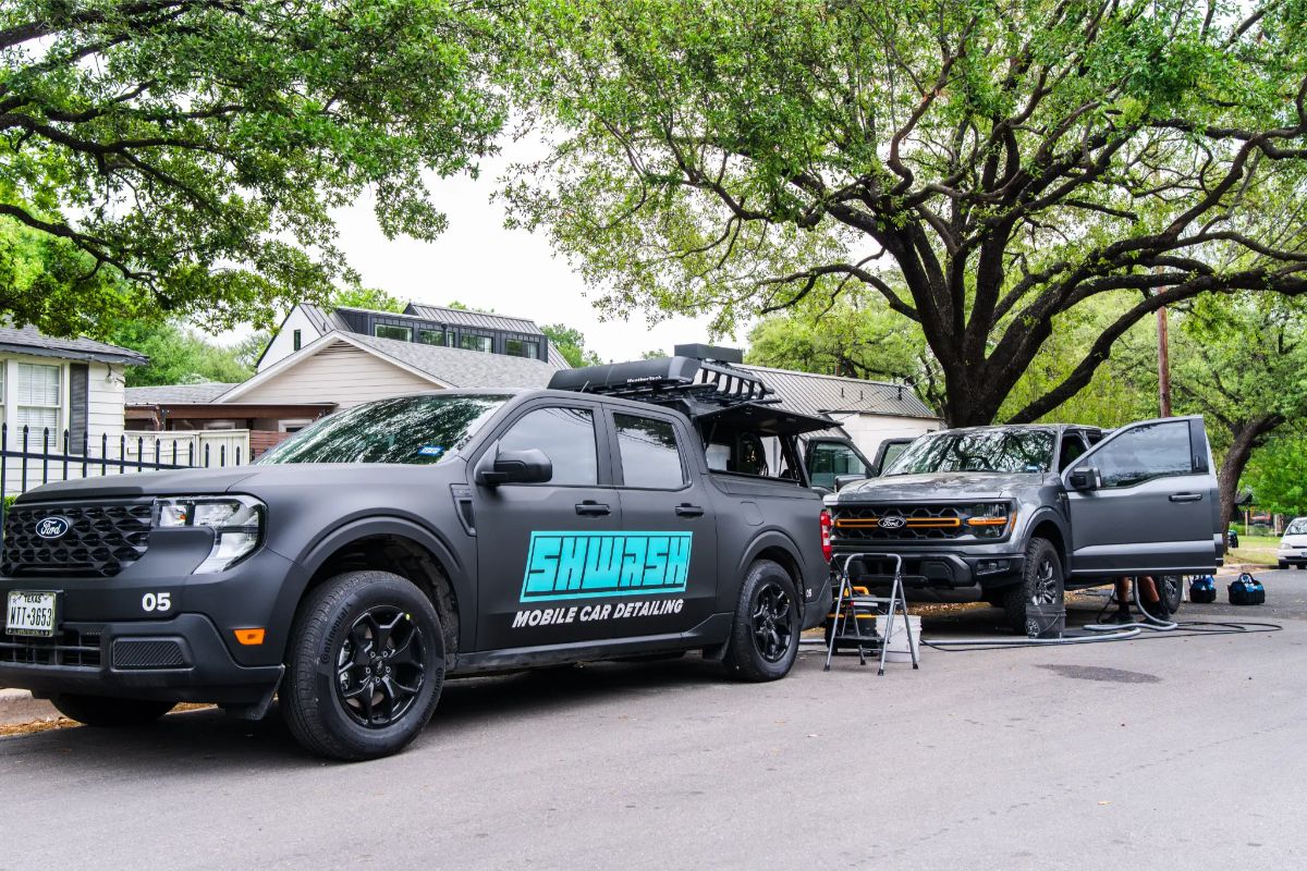 SHWASH mobile car detailing truck servicing a vehicle in Austin TX