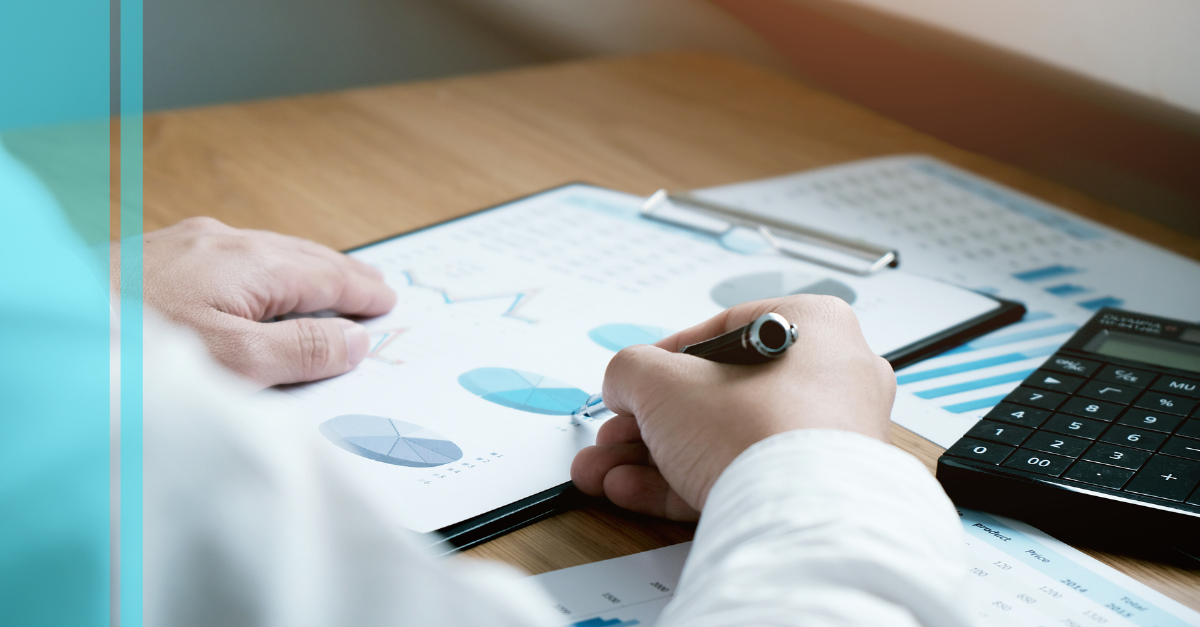 UK employees engaging in a digital toolbox talk using tablets and laptops in a modern white office with blue, lime green, and orange accents.