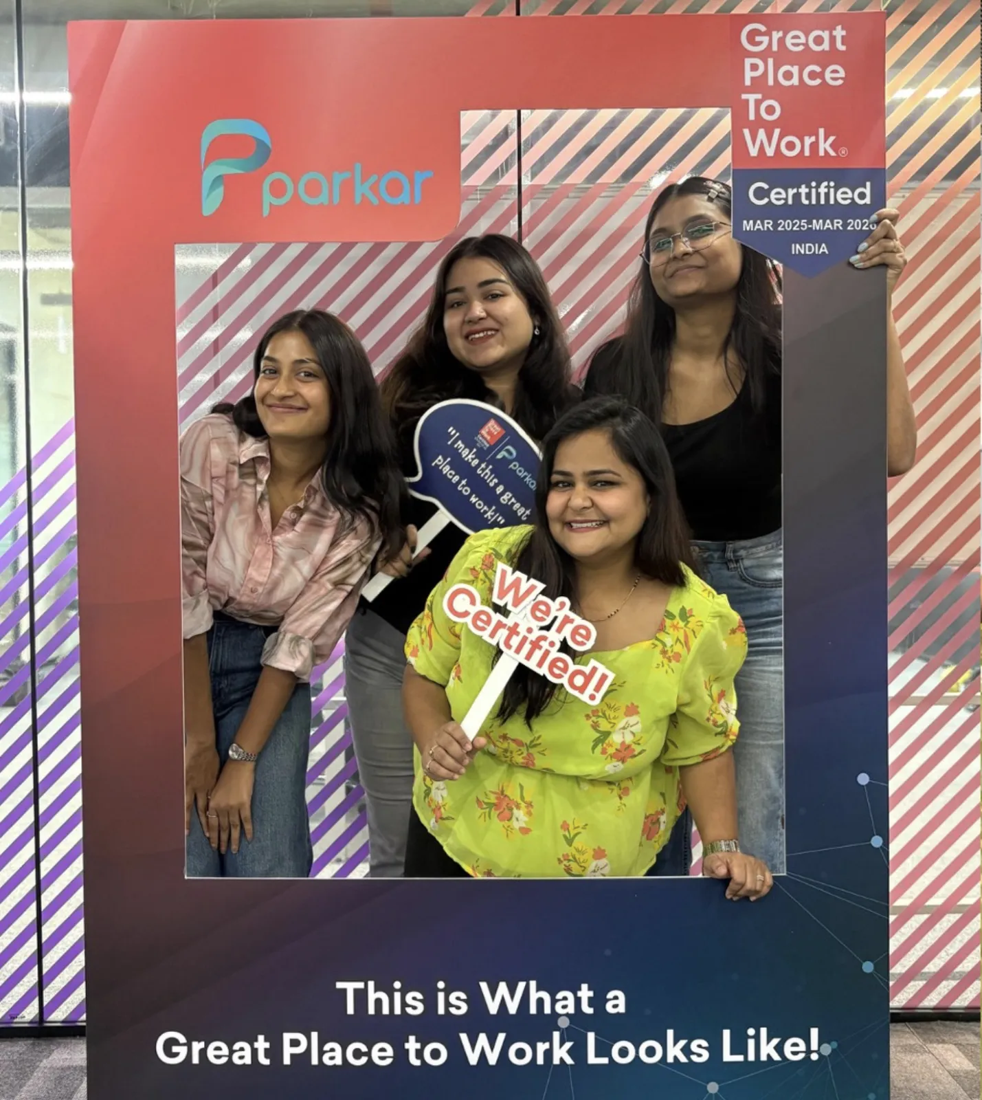 A group of women posing for a photoAI-generated content may be incorrect., Picture