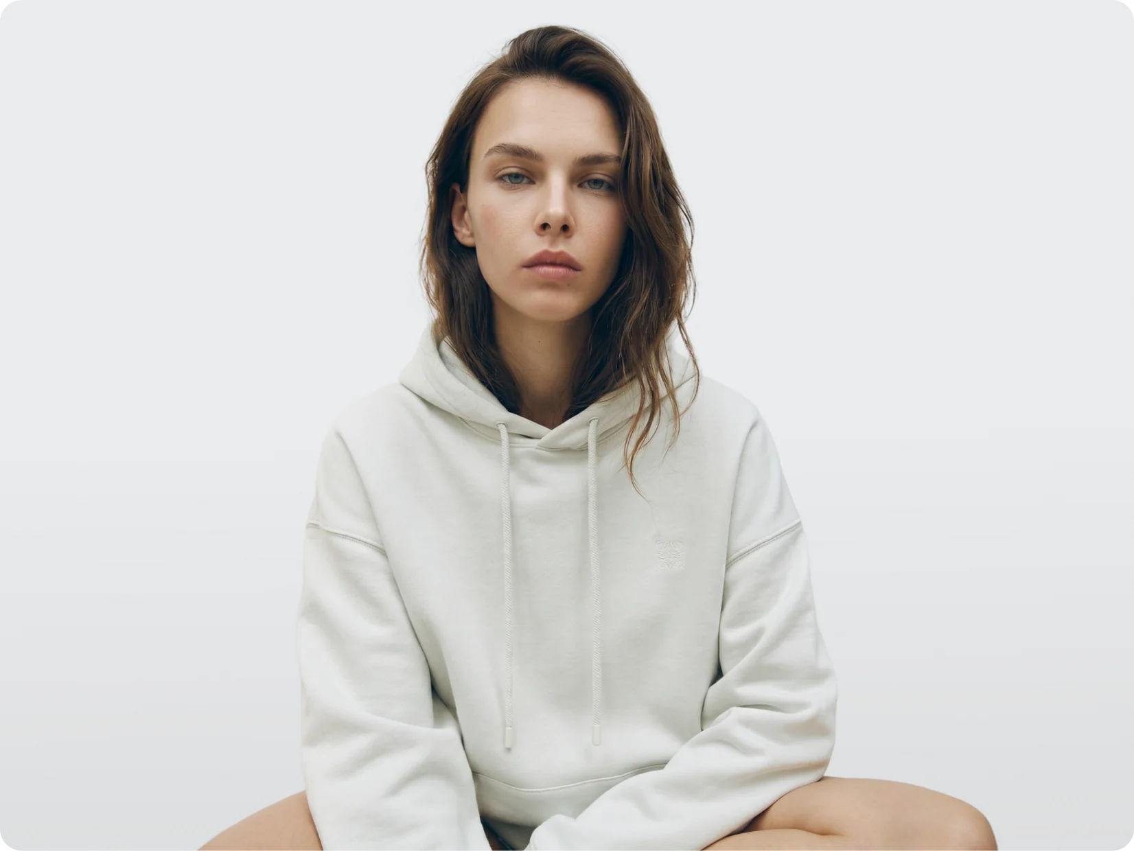 AI generated model in a white hoodie