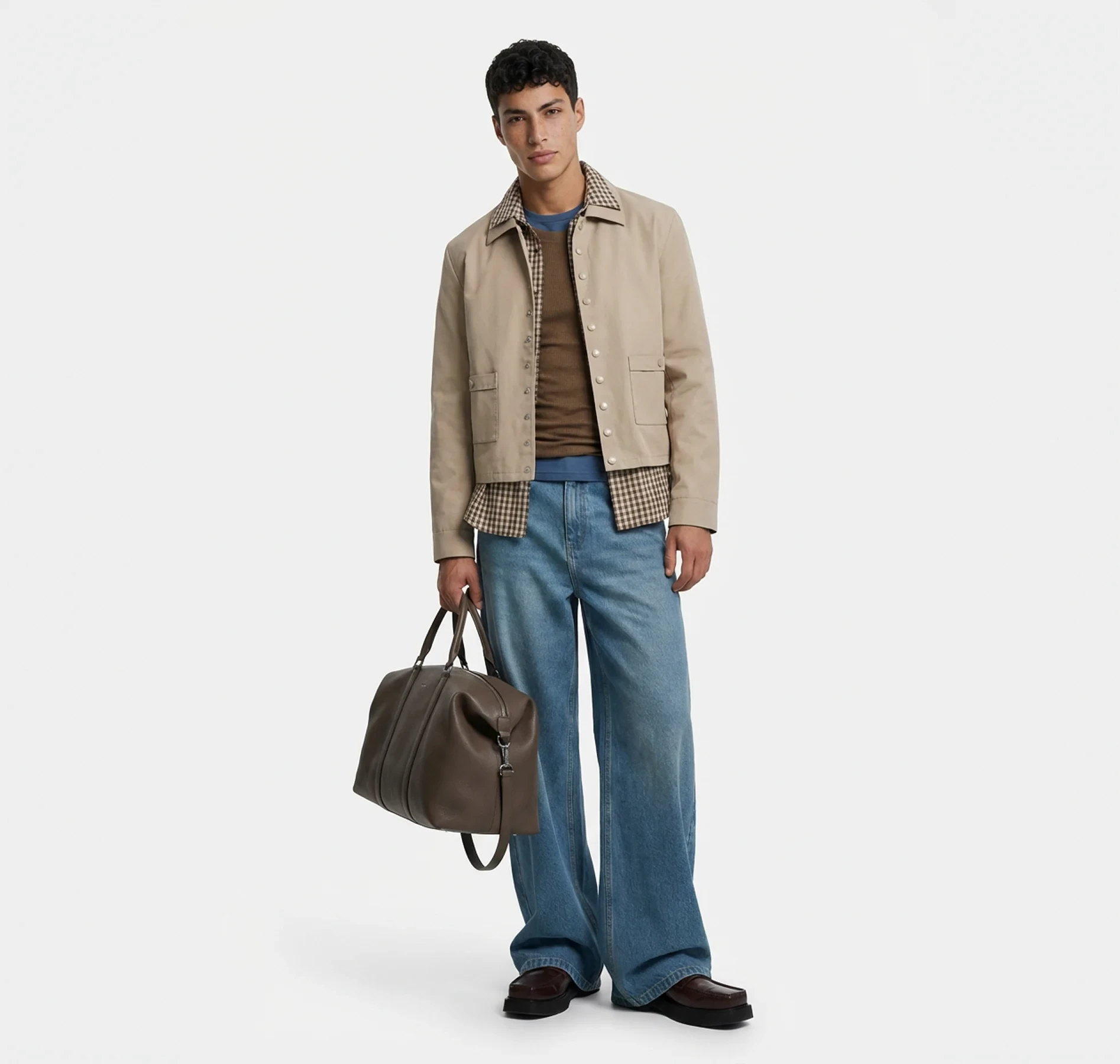 AI generated model in a beige jacket and jeans carrying a leather bag