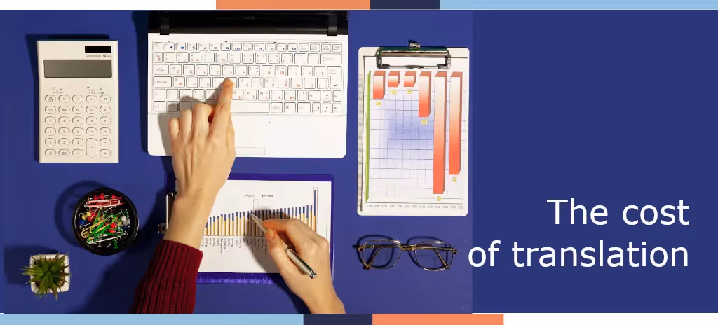 Hands working on charts and calculator with laptop on blue desk