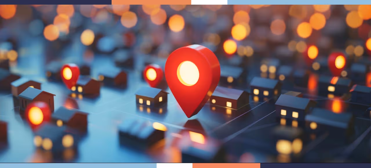 Red location pins glowing on a digital map with miniature houses and blurred lights in the background
