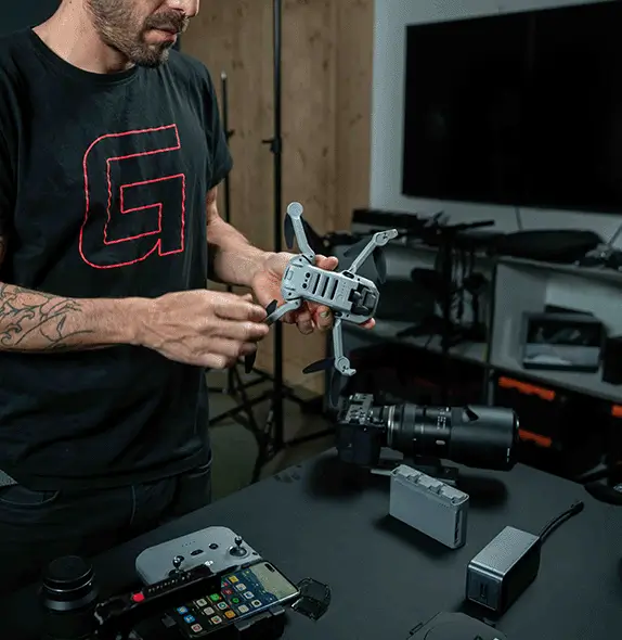 Graphrs videographer in Berlin preparing drone equipment for a social media ad or TV commercial shoot
