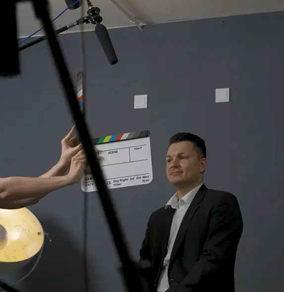 Corporate spokesperson preparing for an employer branding video shoot in Frankfurt studio