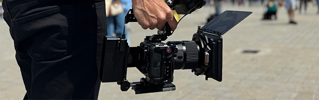 Professional videographer holds a camera during a Graphrs production in Hamburg
