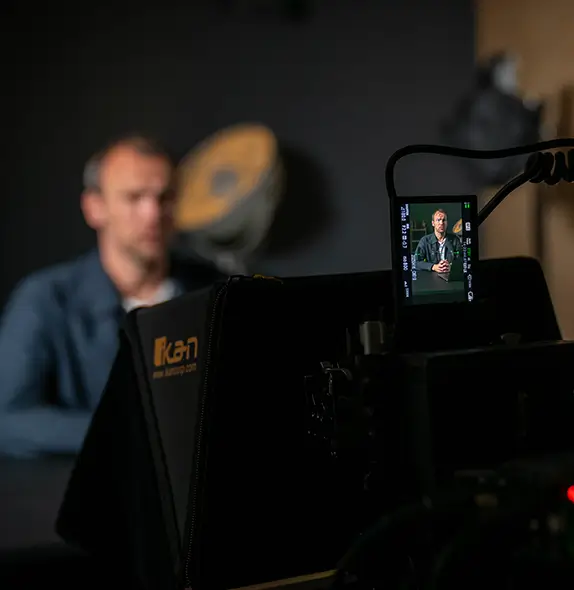 Camera monitor showing a Hamburg-based video shoot for a creative social media ad