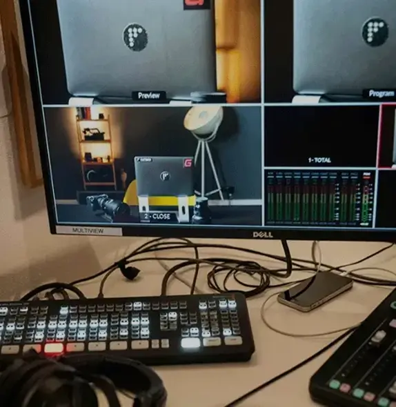Graphrs livestream control room setup with video preview screens and audio mixer in Frankfurt