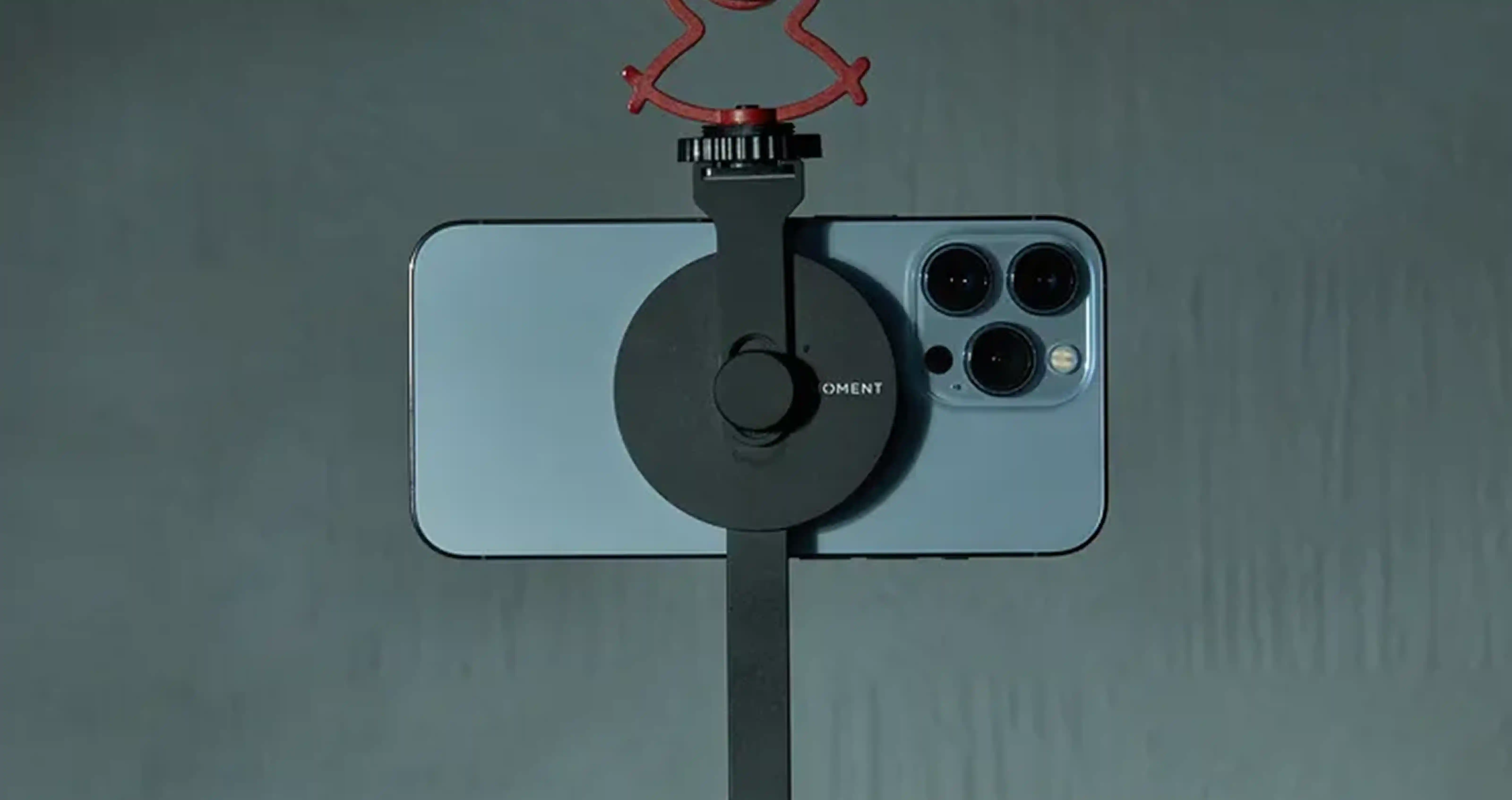 Image of an iPhone on a iPhone specific tripod.