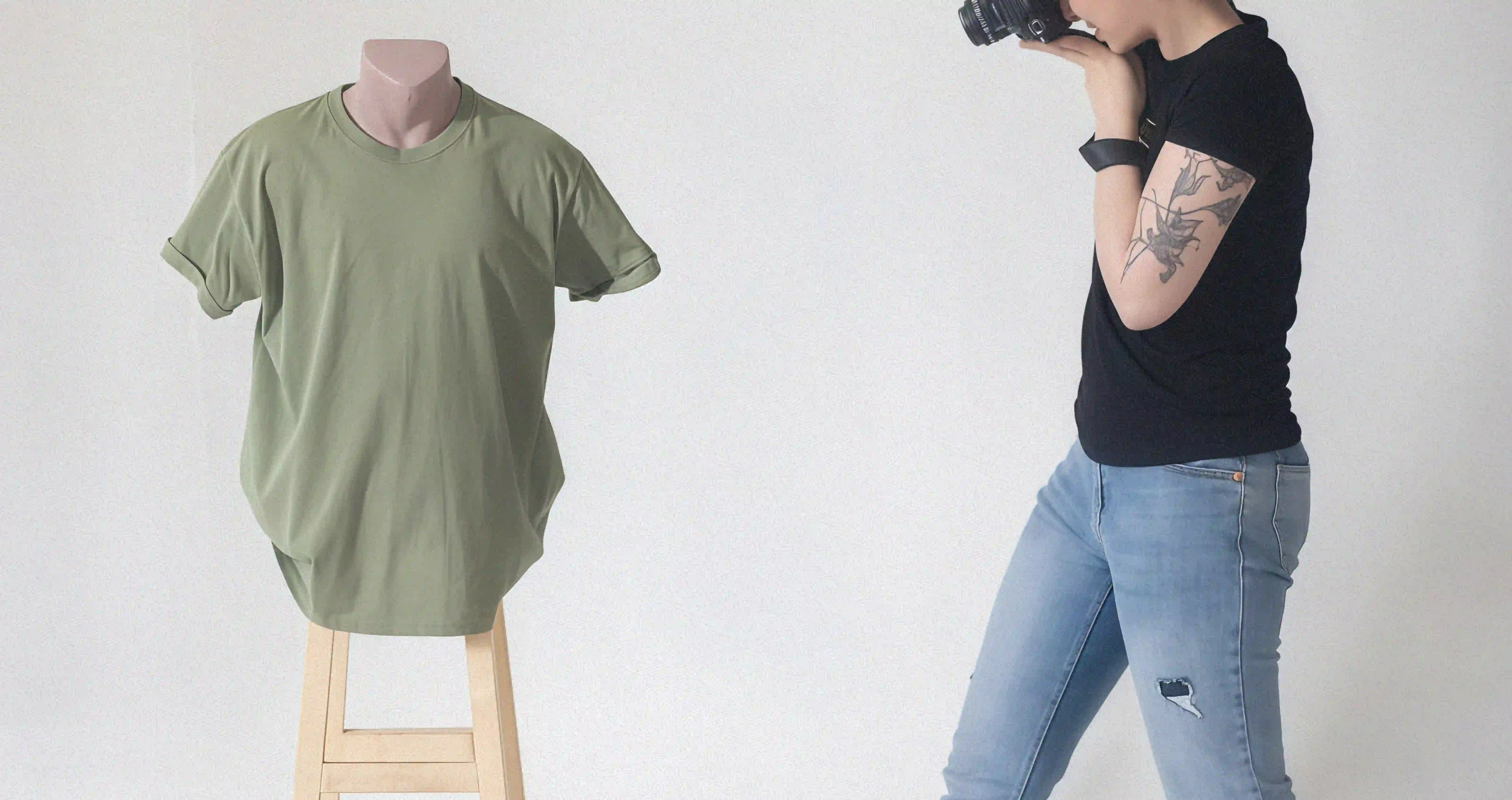 Photographer shooting a green tshirt on a mannequin torso. 