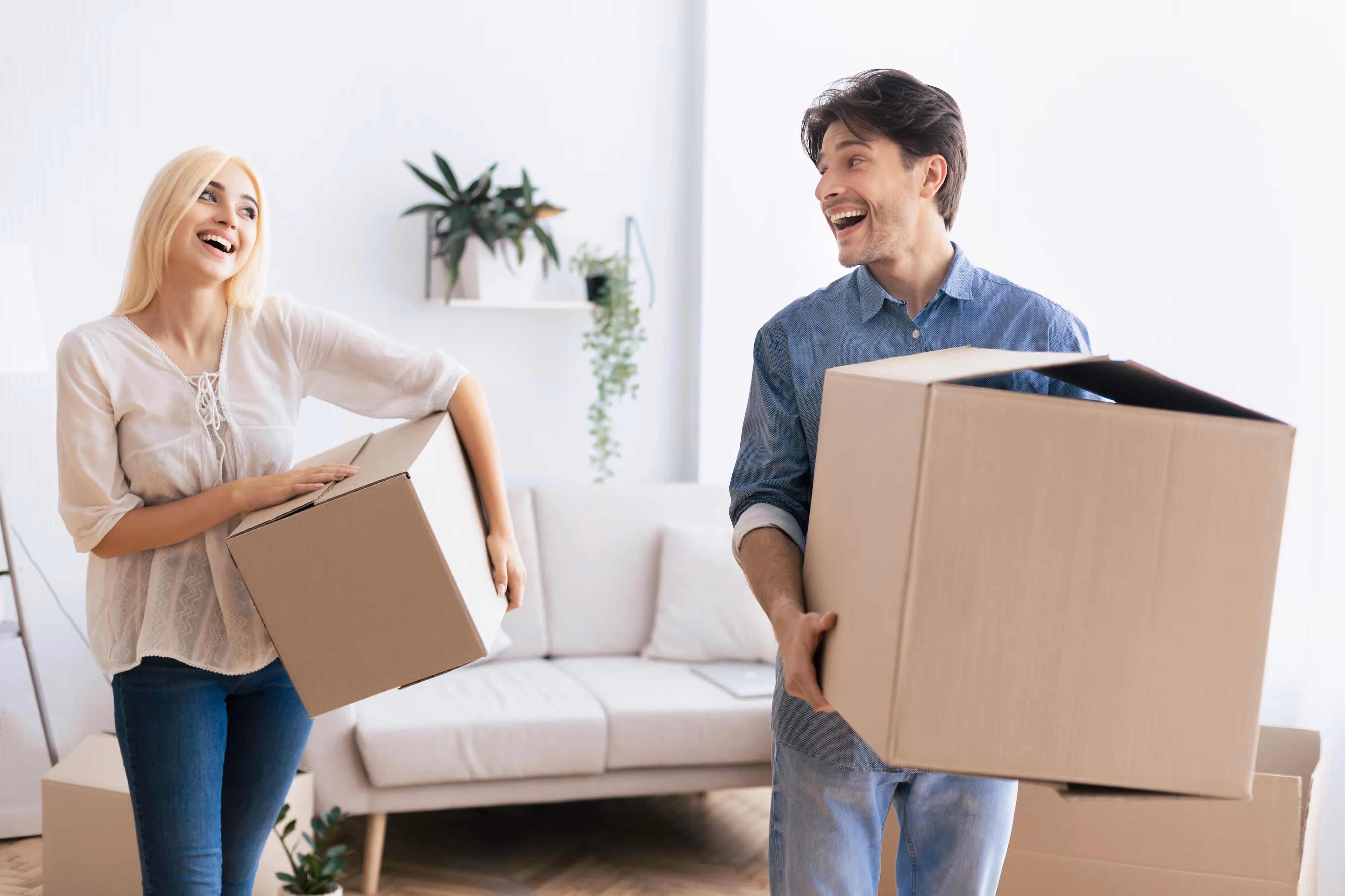 Happy couple moving into their apartment in San Antonio