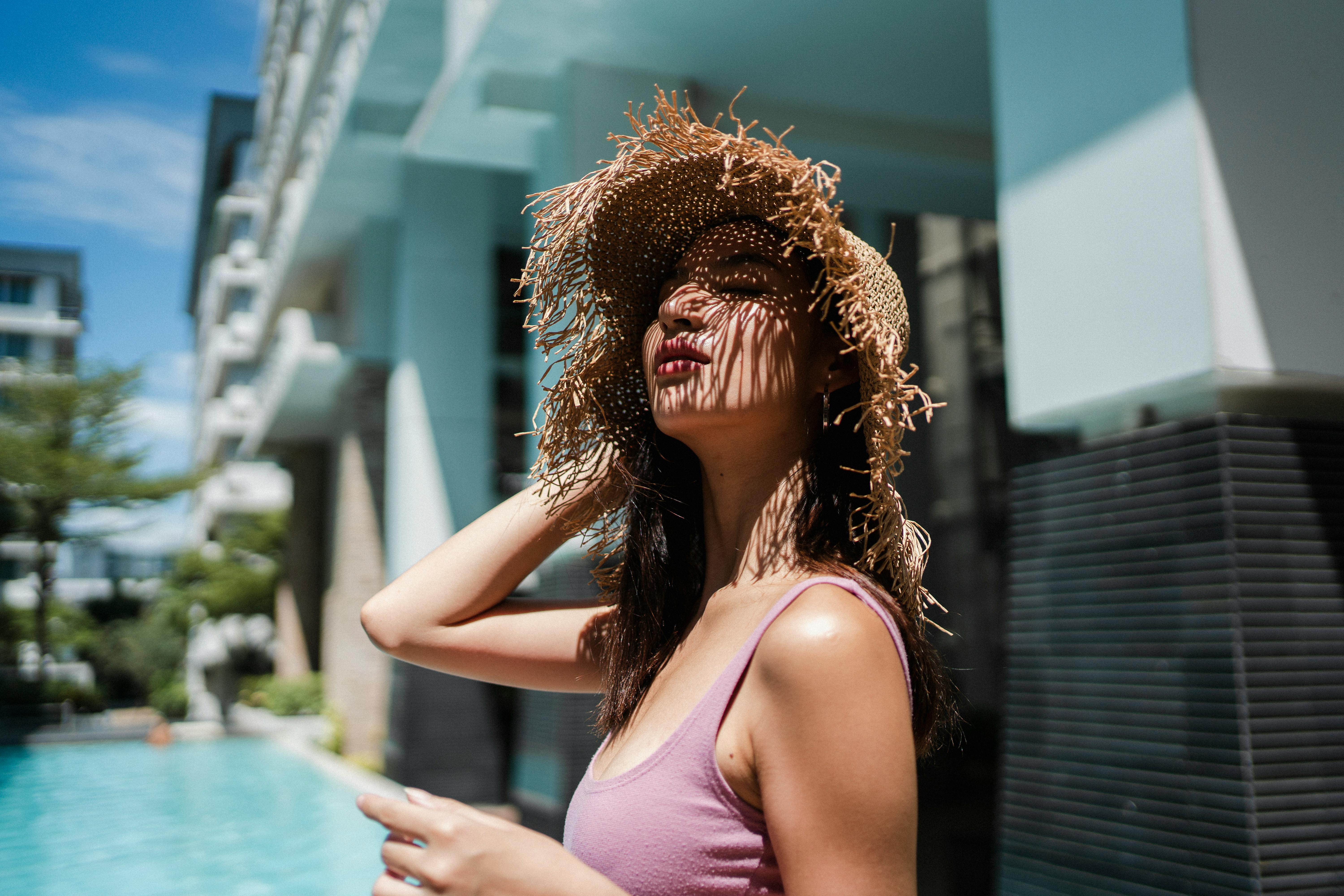 Woman at pool with image