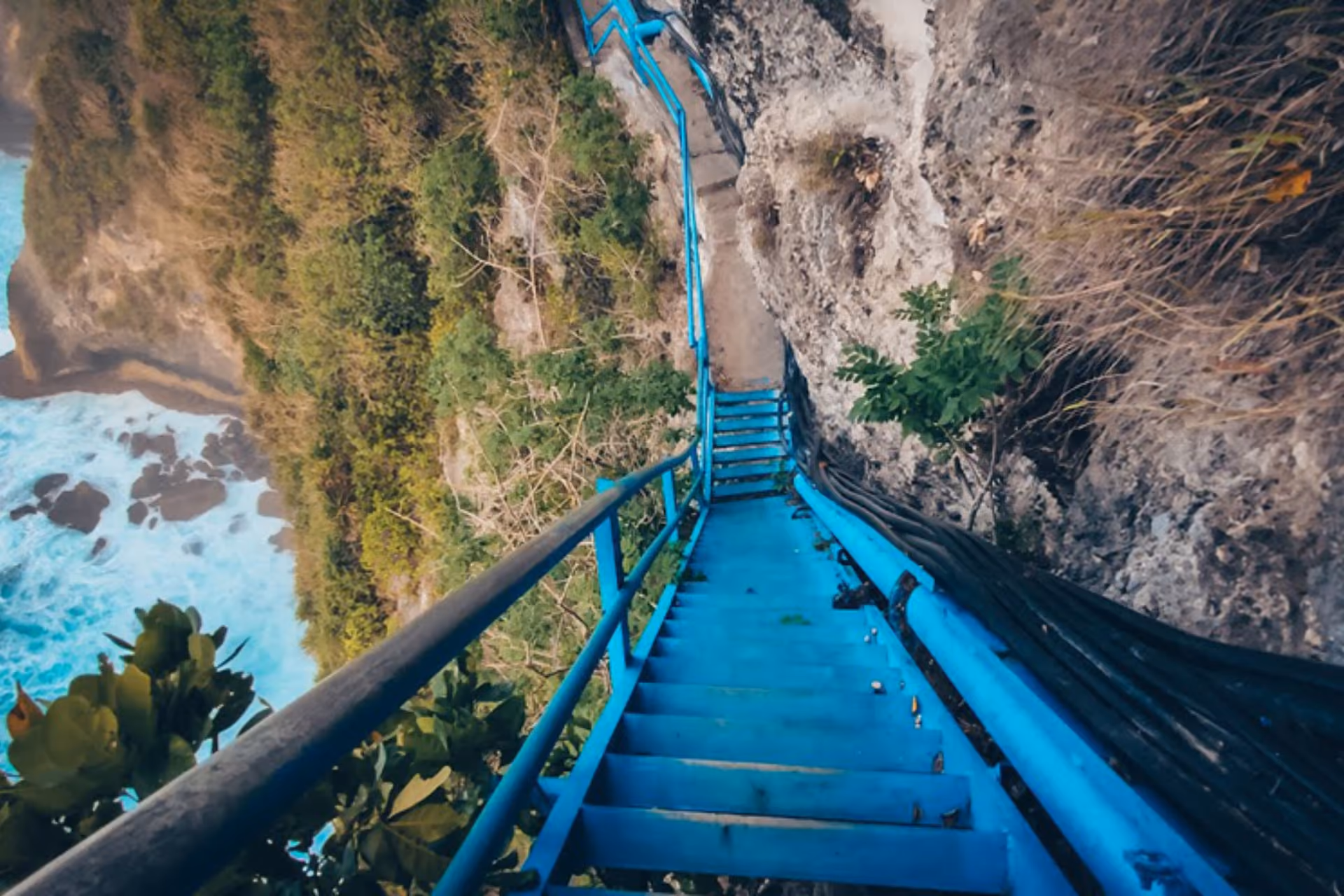Stairs with 700 steps to Peguyangan Waterfalls