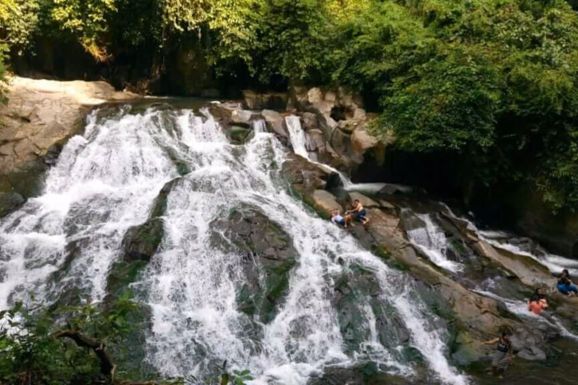 People enjoying themselves at Goa Rang Reng waterfall