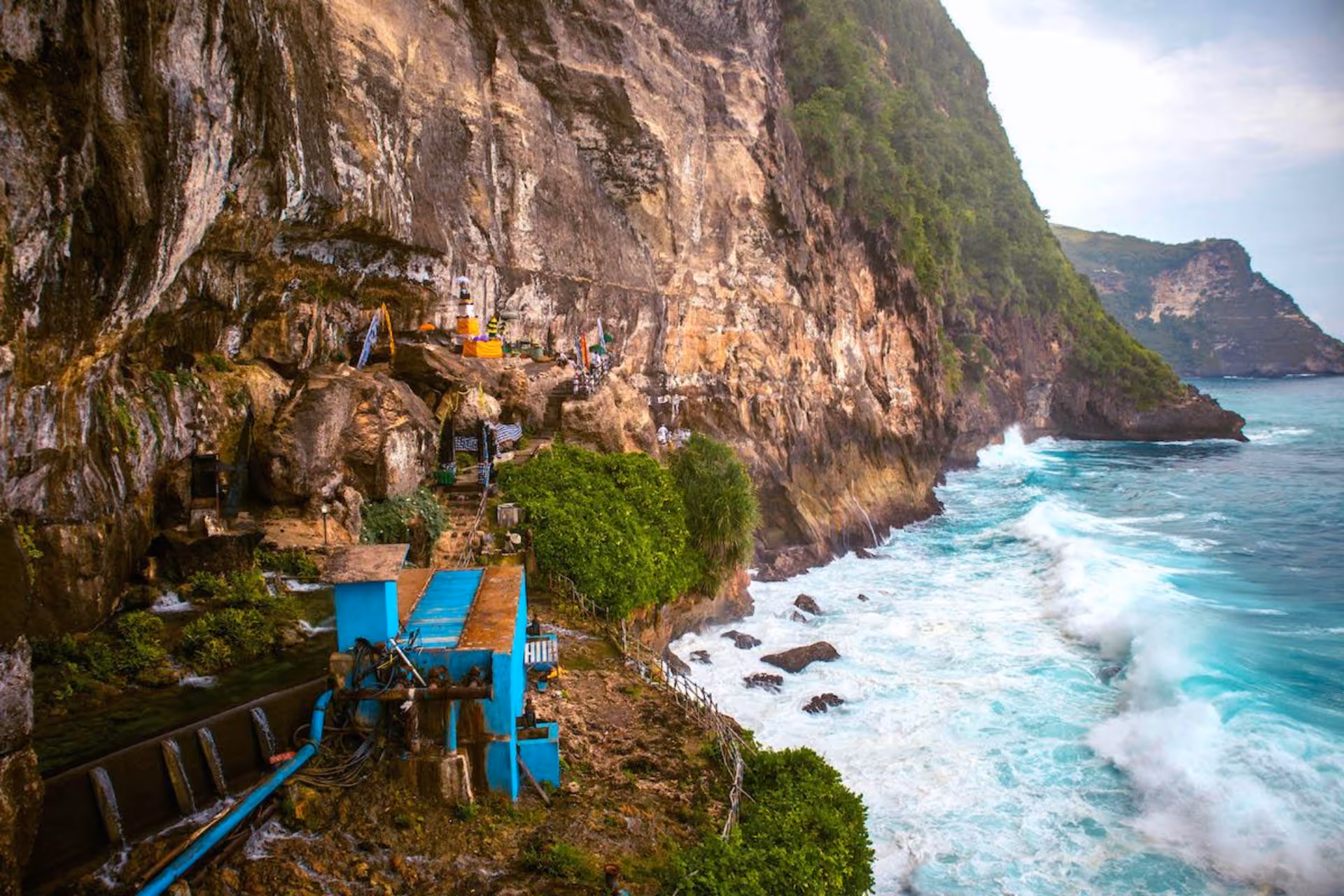 Cliffside view of Peguyangan Waterfall.