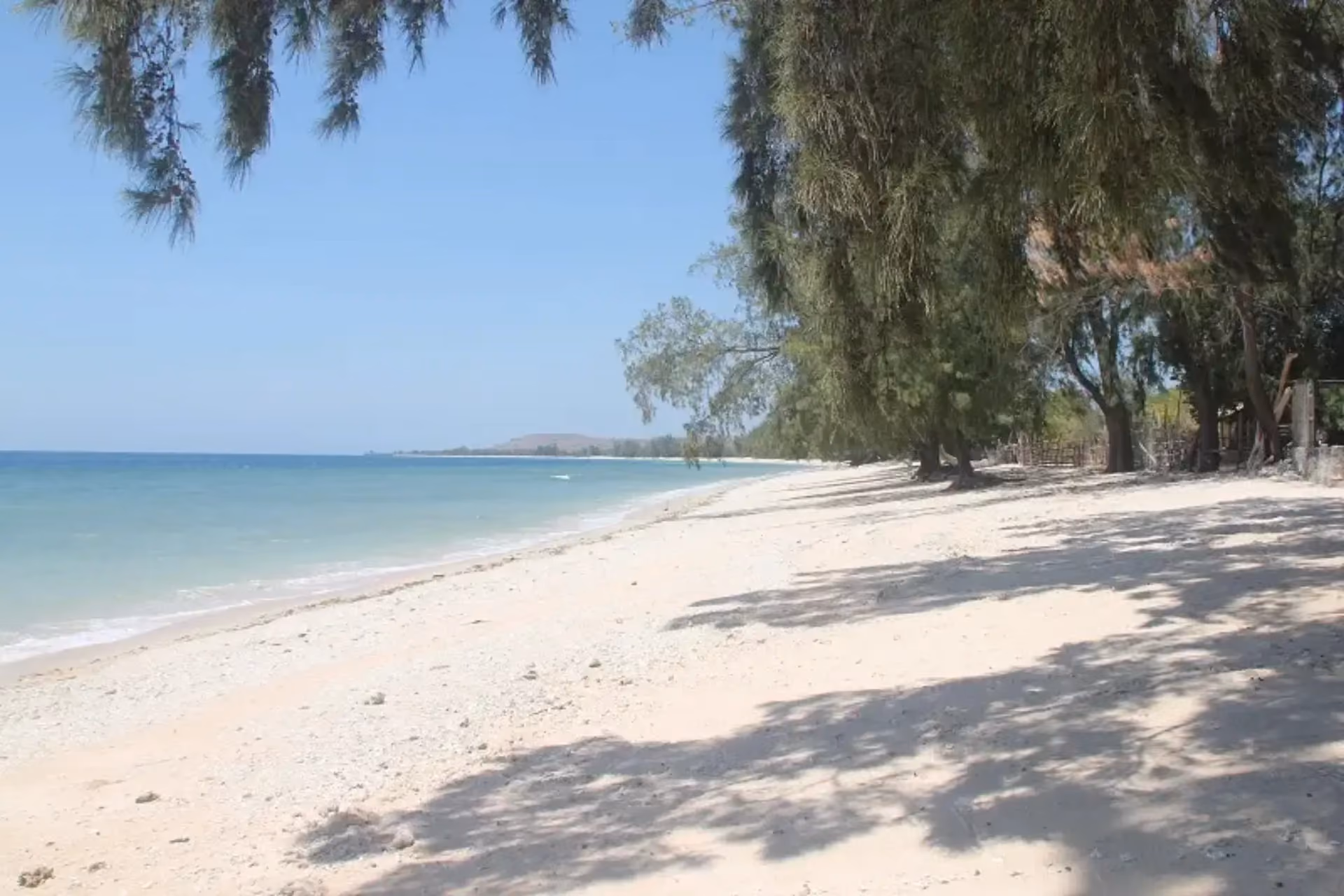 Secluded shoreline of Cemara Beach.