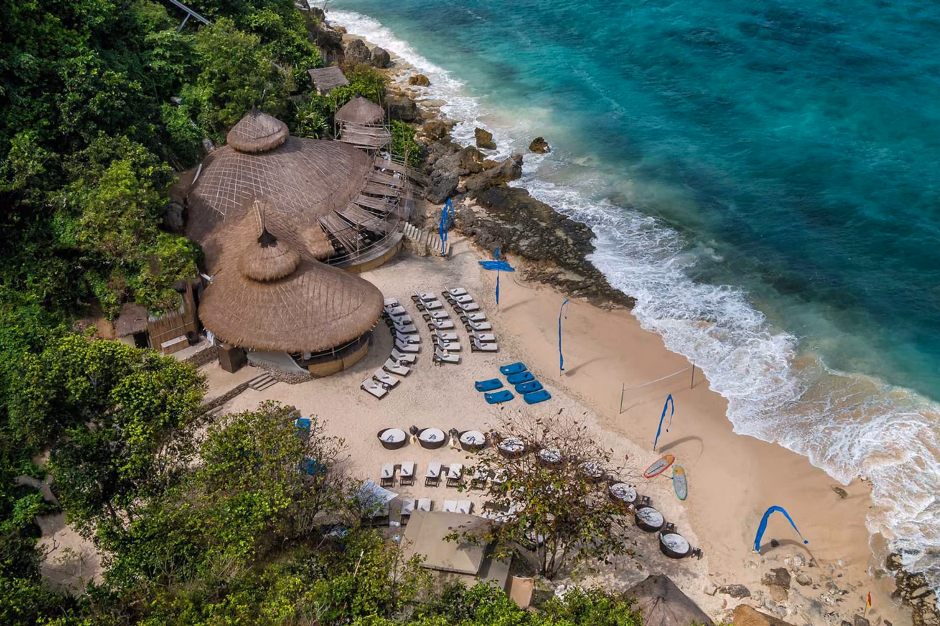 Karma Beach, surrounded in a lush setting.