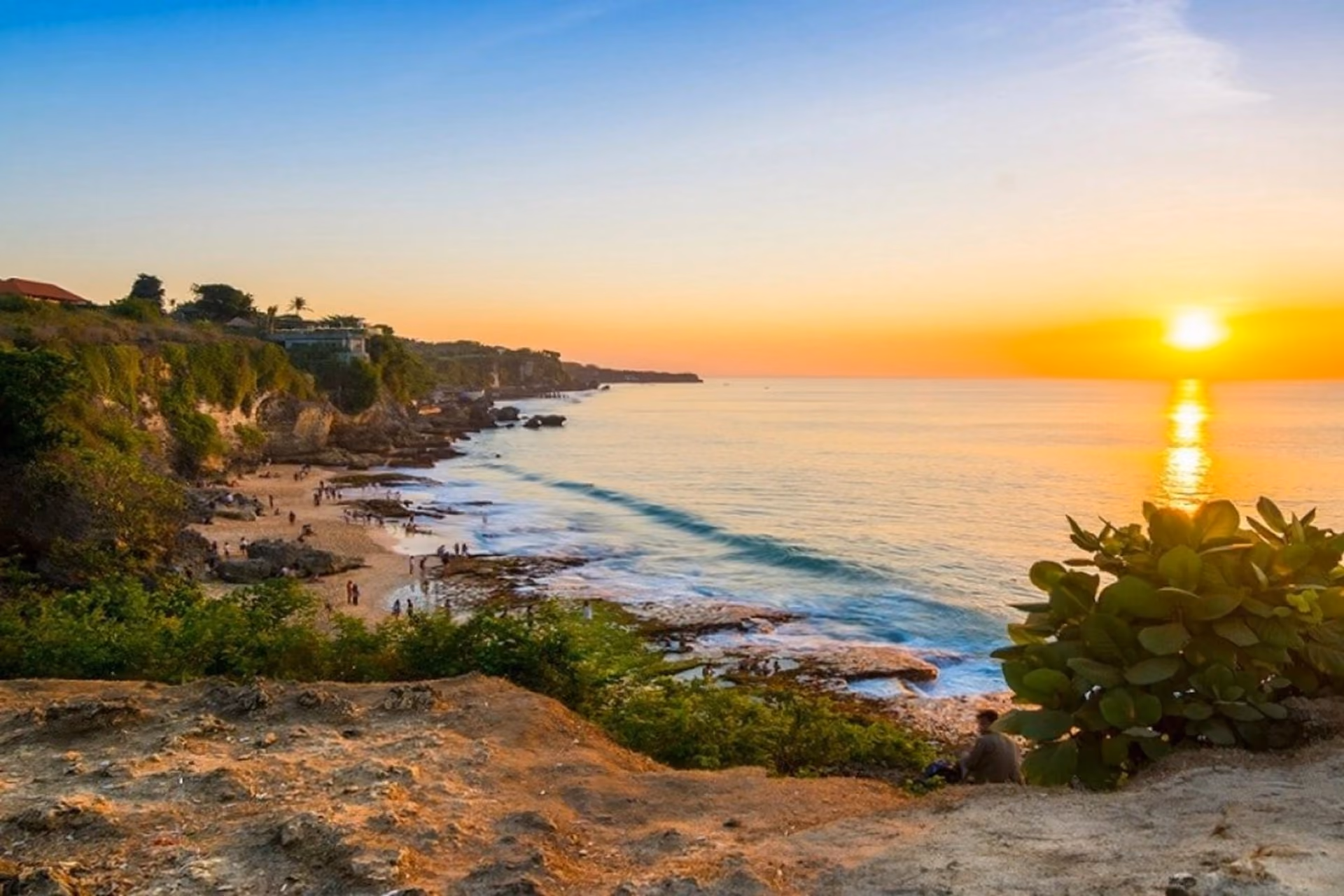 Pantai Tegal Wangi beach with breathtaking ocean views, gentle waves, and rocky cliffs.