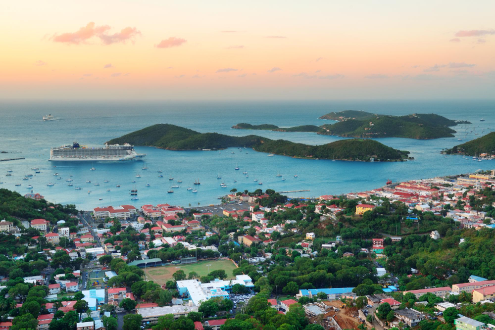 islands sunrise with colorful cloud, buildings and beach coast