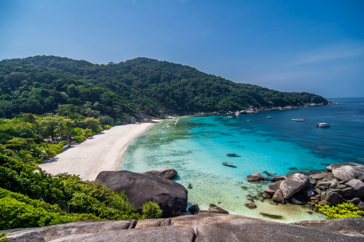 Koh Samui, Thailand, with palm-lined beaches, blue waters, and a tropical island landscape
