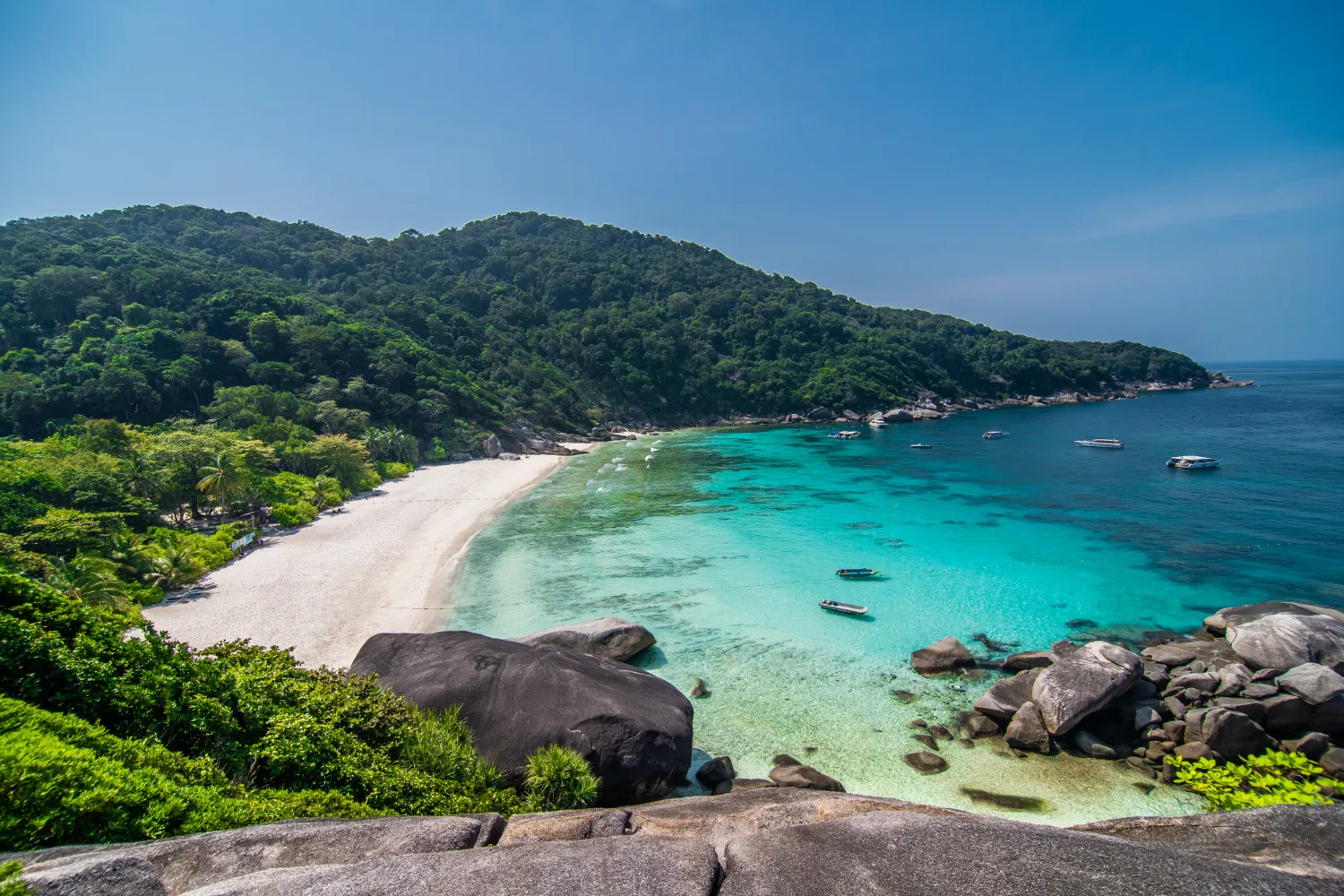 Koh Samui, Thailand, with palm-lined beaches, blue waters, and a tropical island landscape