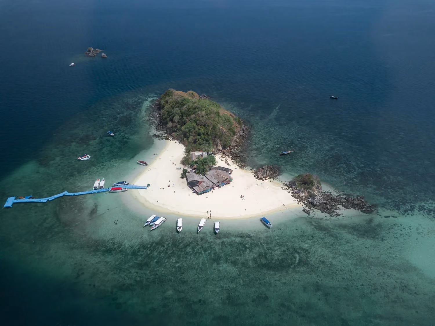 Angthong National Marine Park, Thailand, featuring a cluster of lush islands, clean waters, and limestone cliffs.