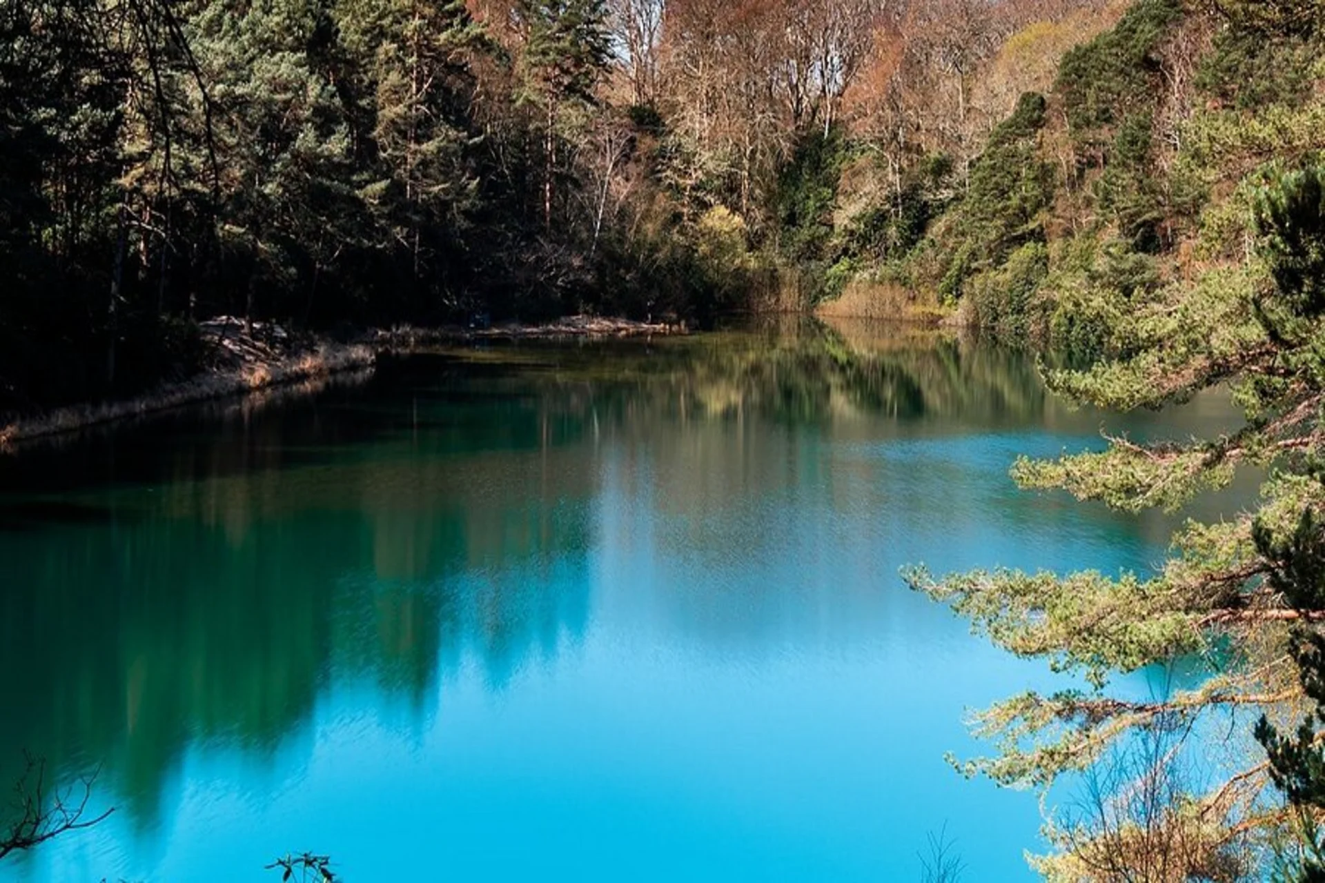 A hidden gem glowing in its natural blue — the perfect quiet moment for nature-loving couples