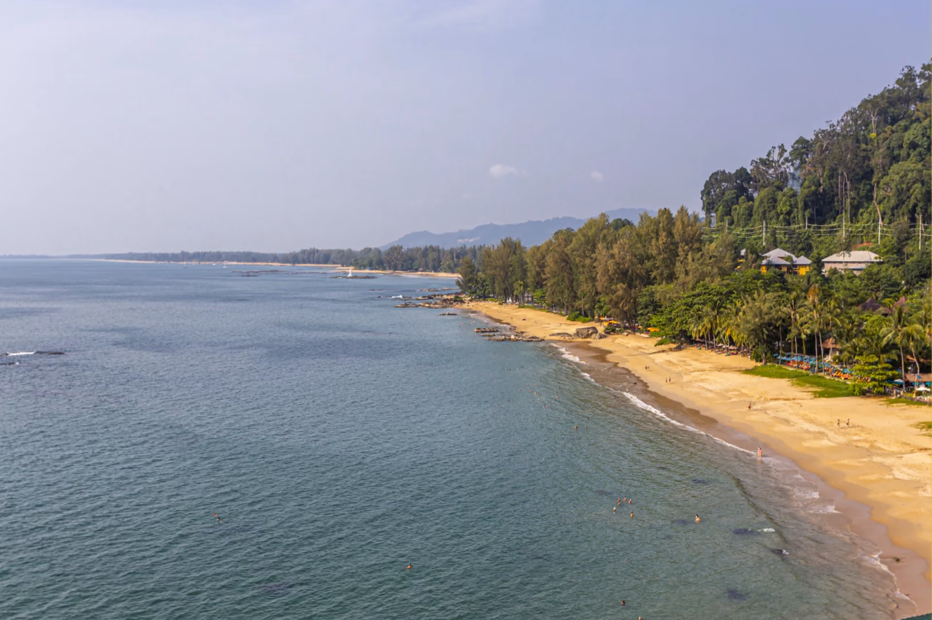 Shallow turquoise waves and pastel sunsets — Loh Dalum feels made for couples