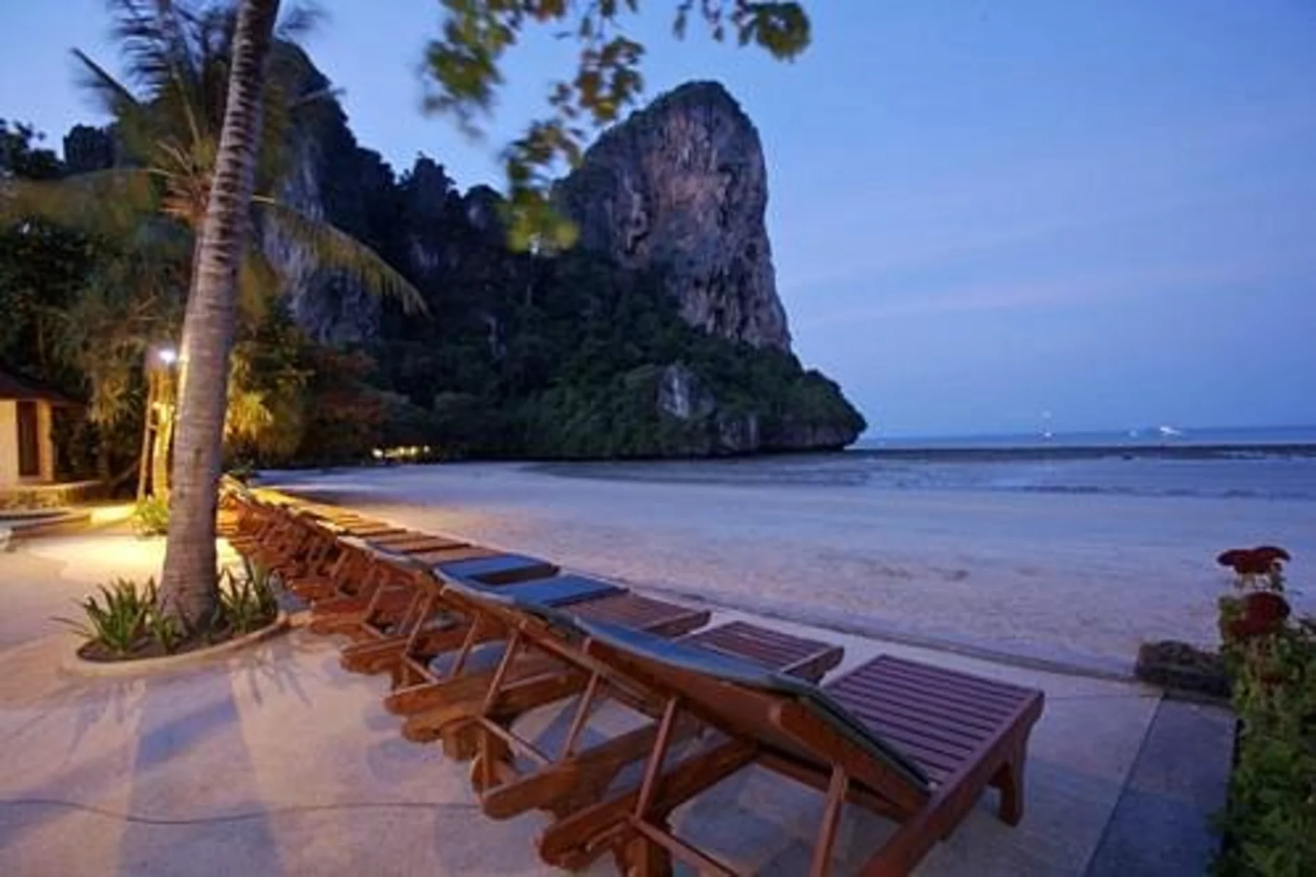 Beachfront cottages surrounded by cliffs—Railay Bay is perfect for peaceful, romantic stays
