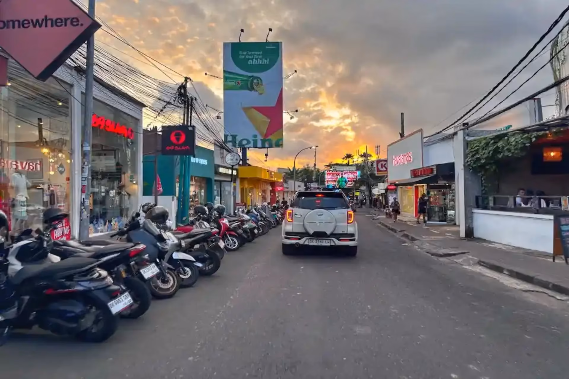Explore Seminyak’s iconic street lined with stylish shops, boutique stores, and vibrant cafés