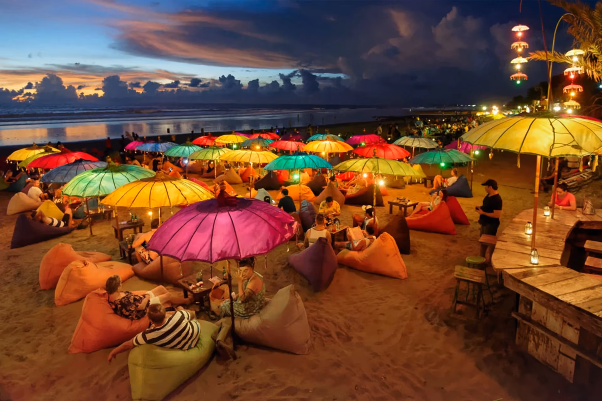 Surf, volleyball & stunning sunsets — Double Six brings people together every evening.