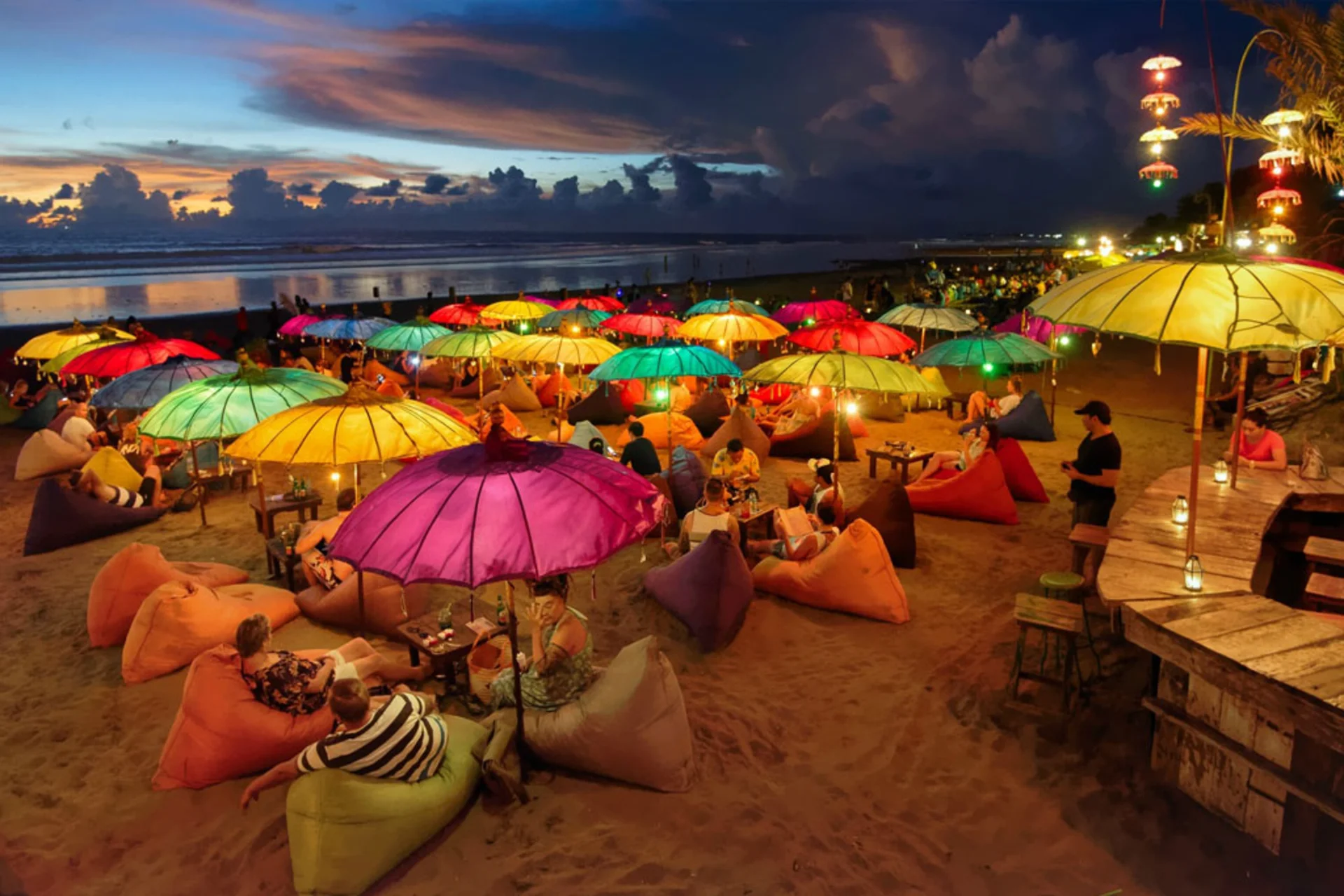 Surf, volleyball & stunning sunsets — Double Six brings people together every evening.