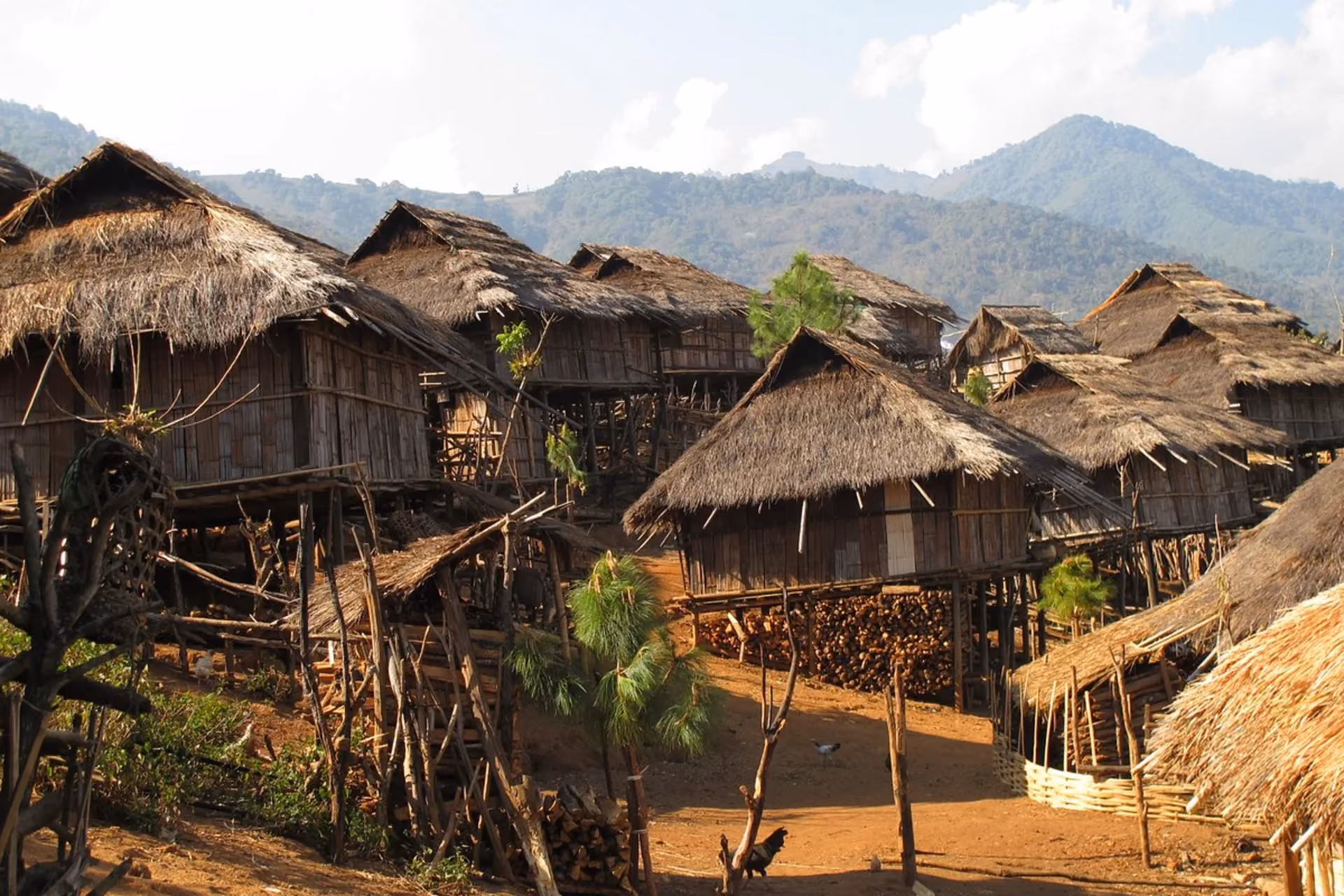 A cultural experience featuring traditional lifestyles, crafts, and mountain views.