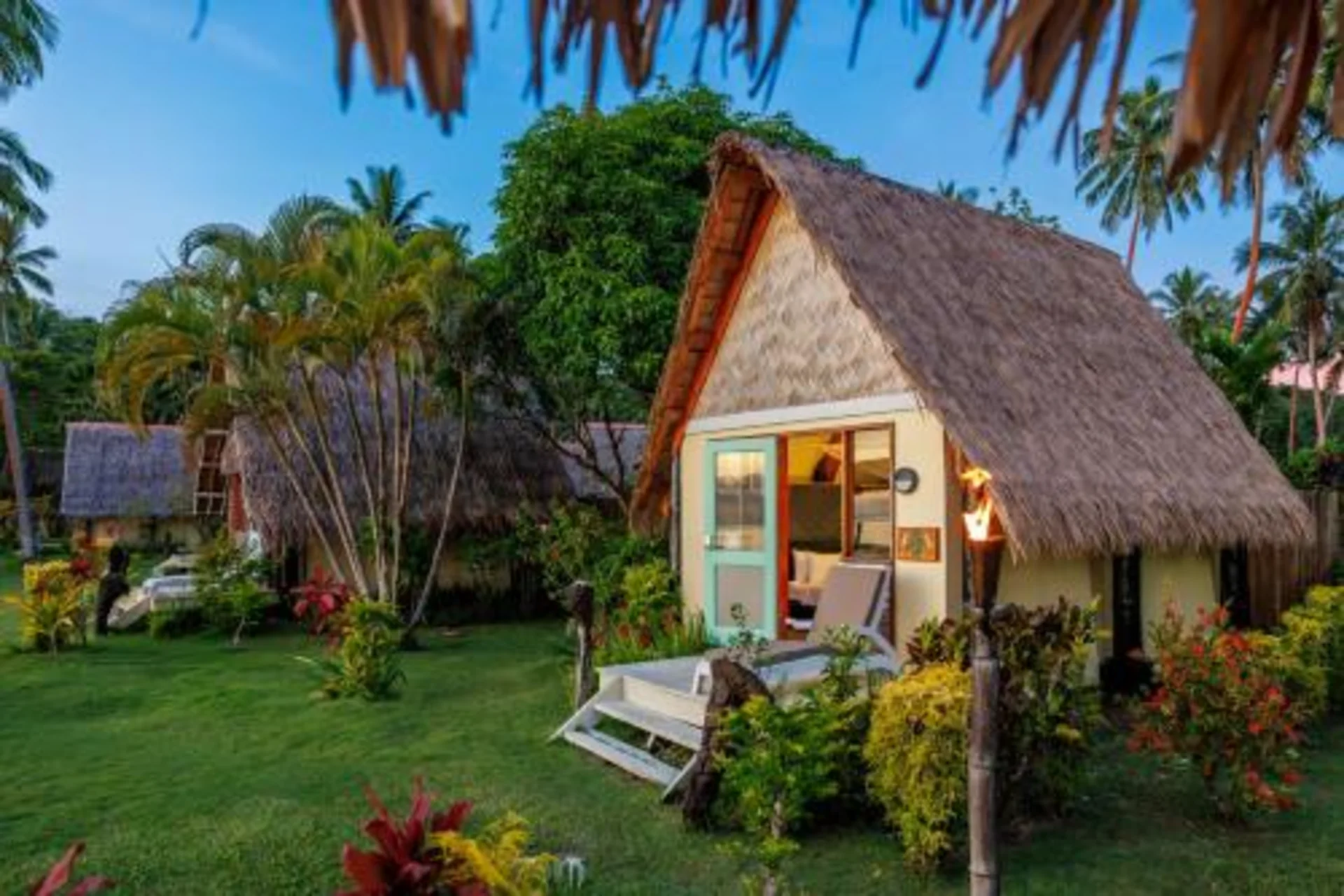 Peaceful garden bungalows perfect for budget travelers seeking a nature-friendly stay.