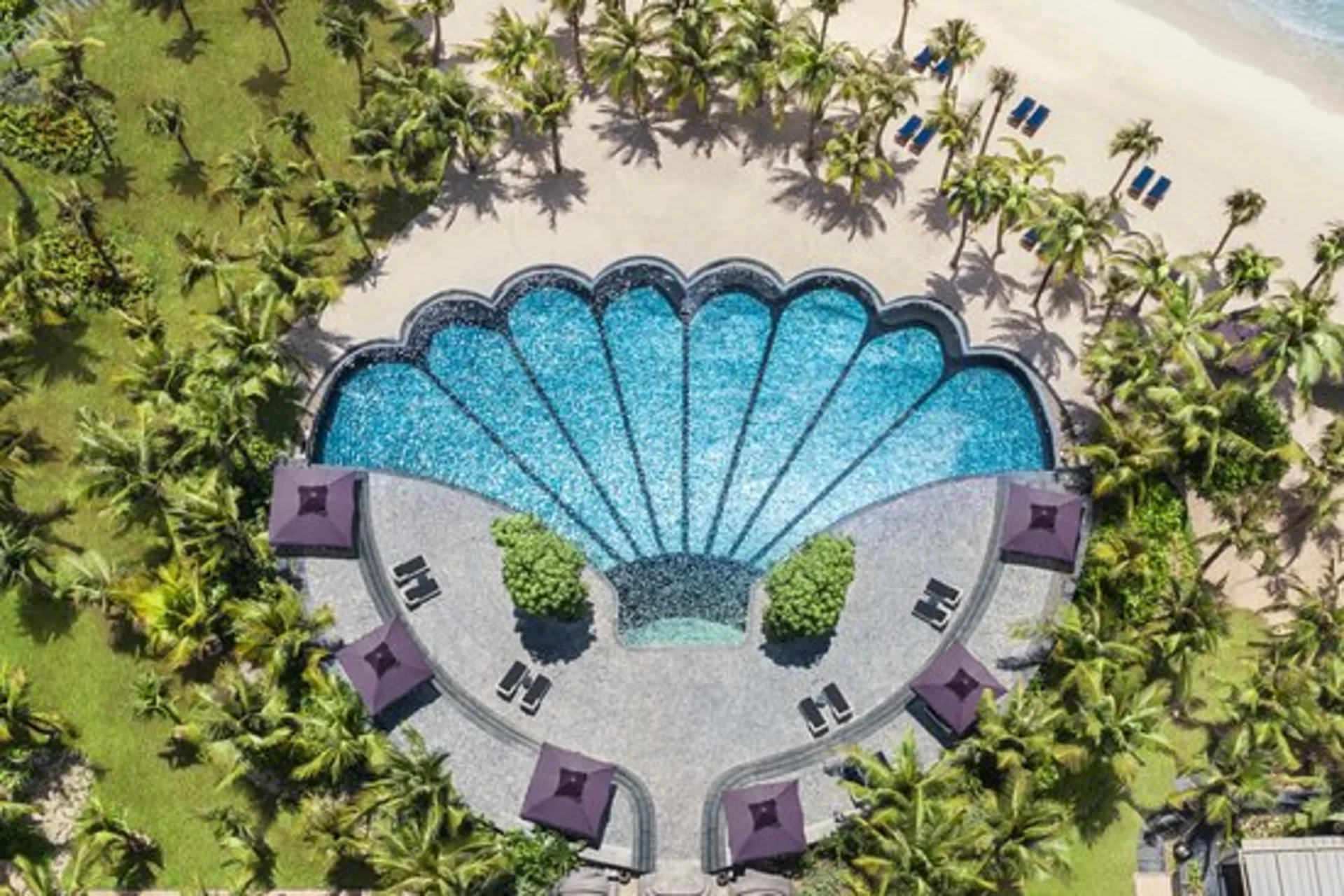 A lavish beachfront retreat with unique architecture and world-class amenities.