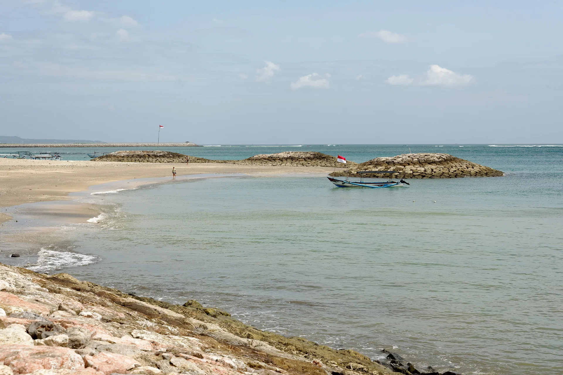 Quiet sands and scenic coastal views at Jerman Beach, Kuta.