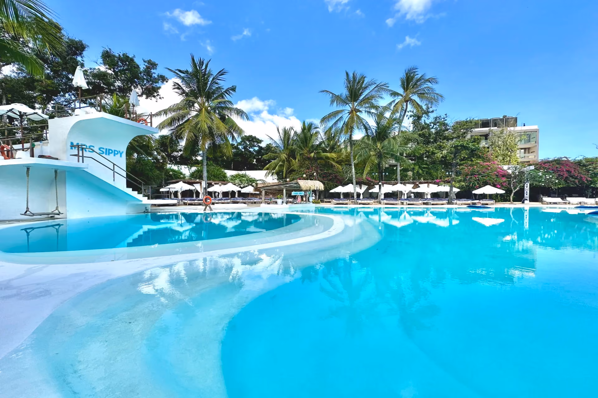 Daytime pool parties and fun cabana scenes at Mrs Sippy Bali.