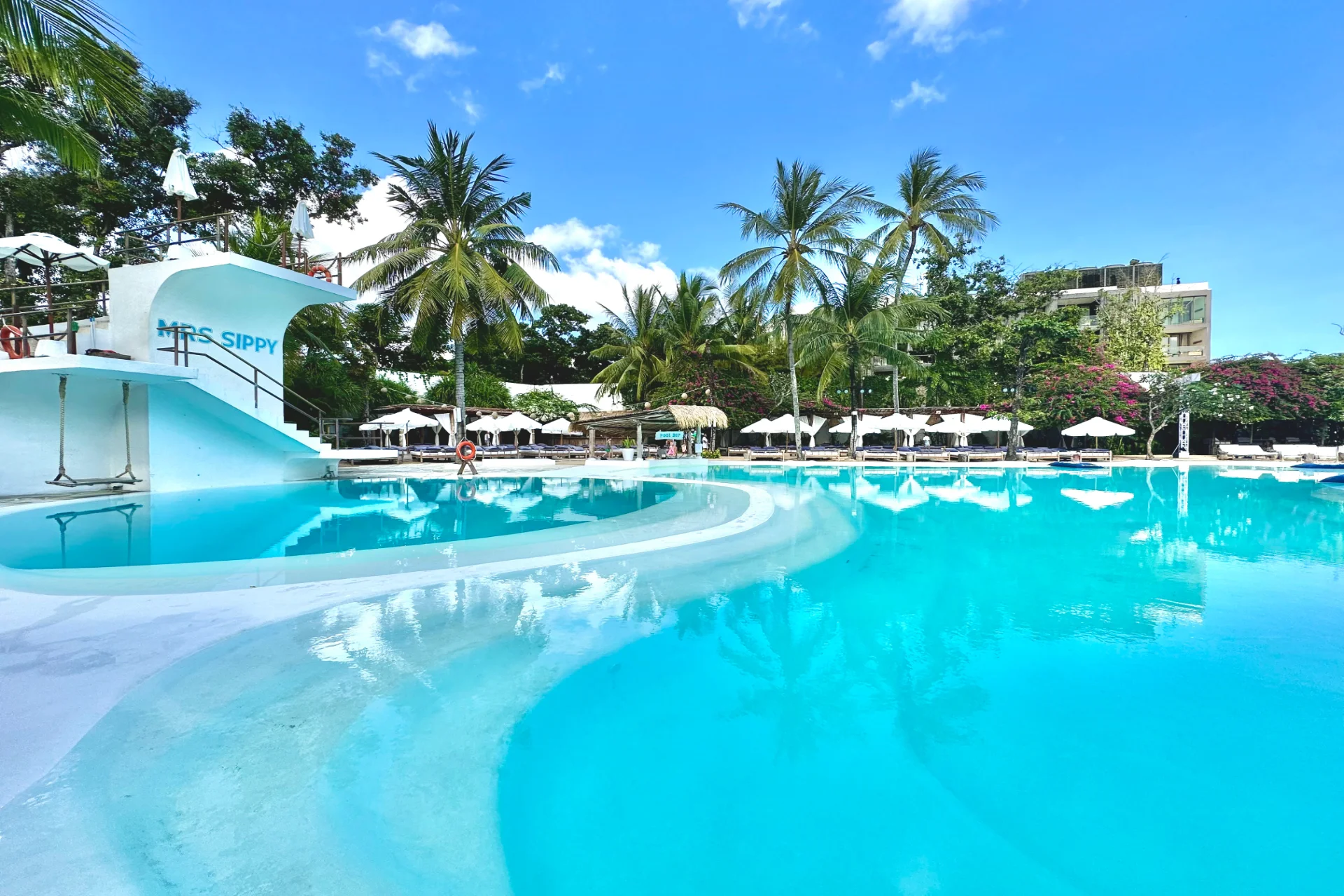 Daytime pool parties and fun cabana scenes at Mrs Sippy Bali.