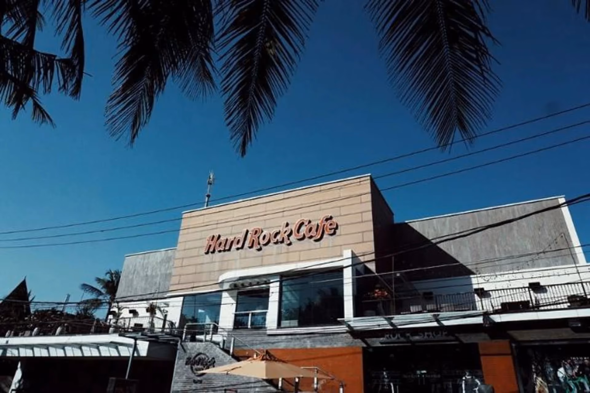Live music and vibrant dining atmosphere at Hard Rock Cafe Bali.