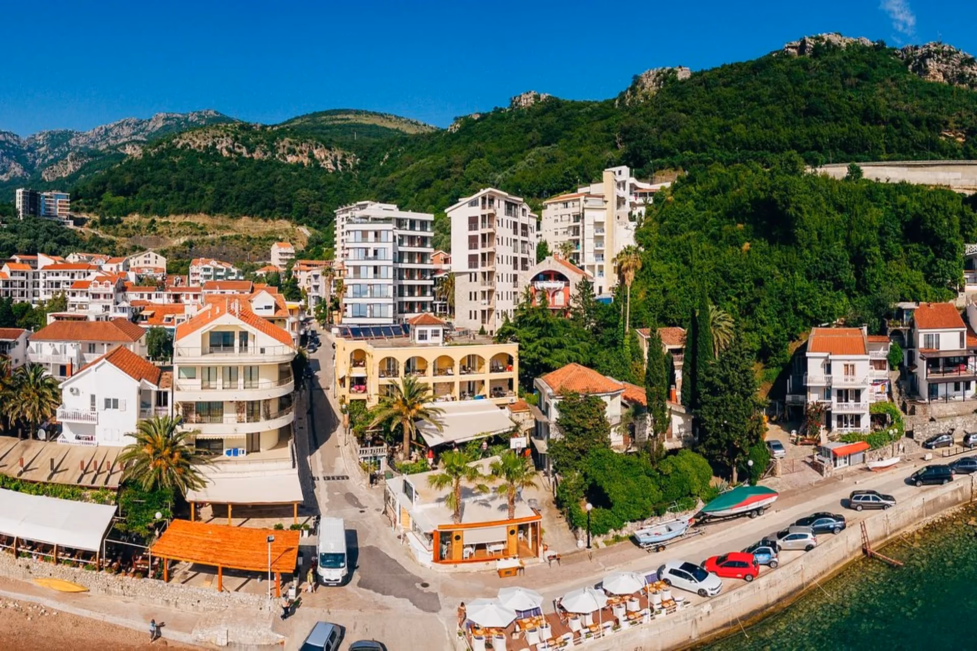 Adriatic coastlines, old towns, and scenic bays shine under early summer light in Montenegro.