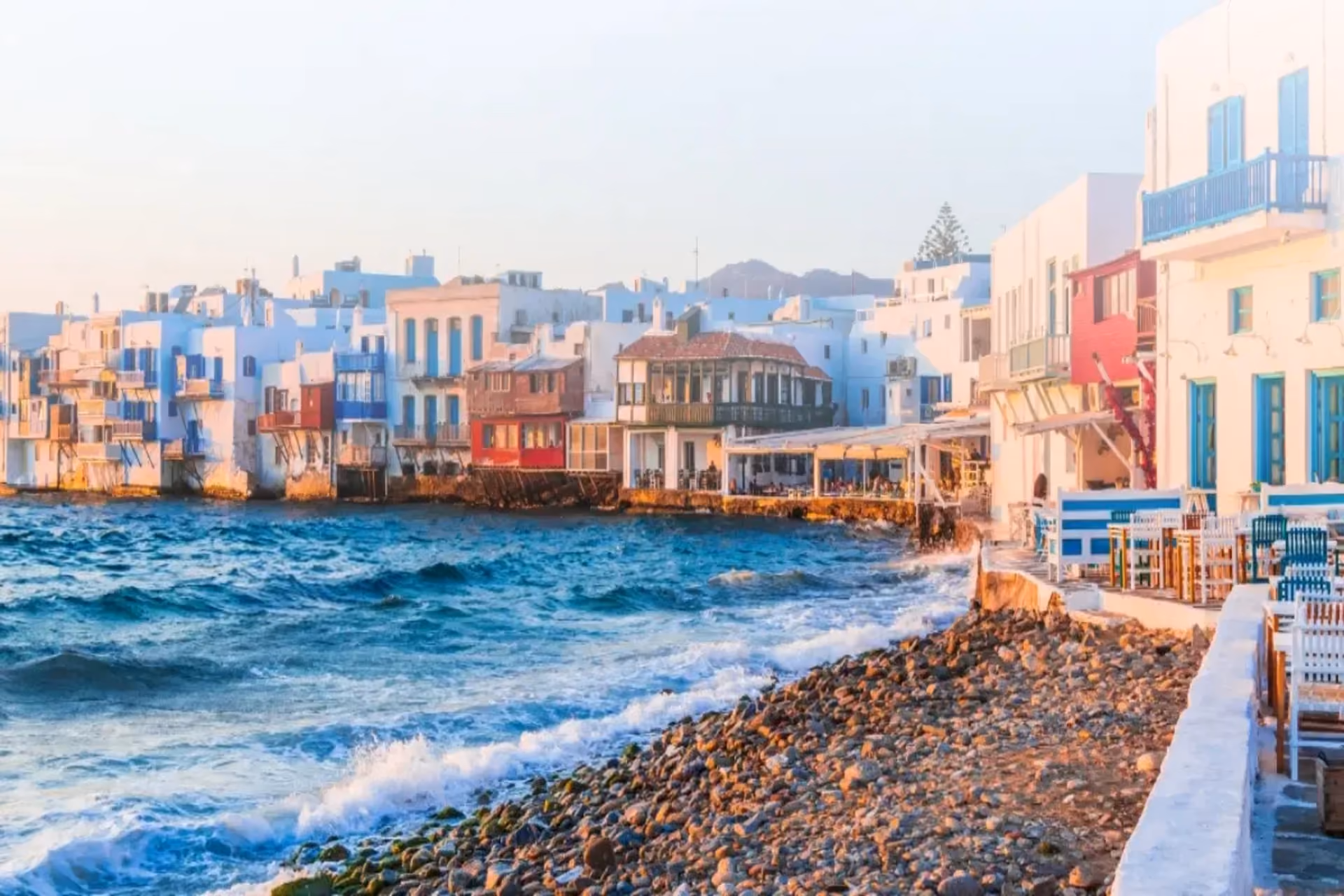Clear skies, blue waters, and ancient ruins make Greece one of the most iconic summer destinations in June